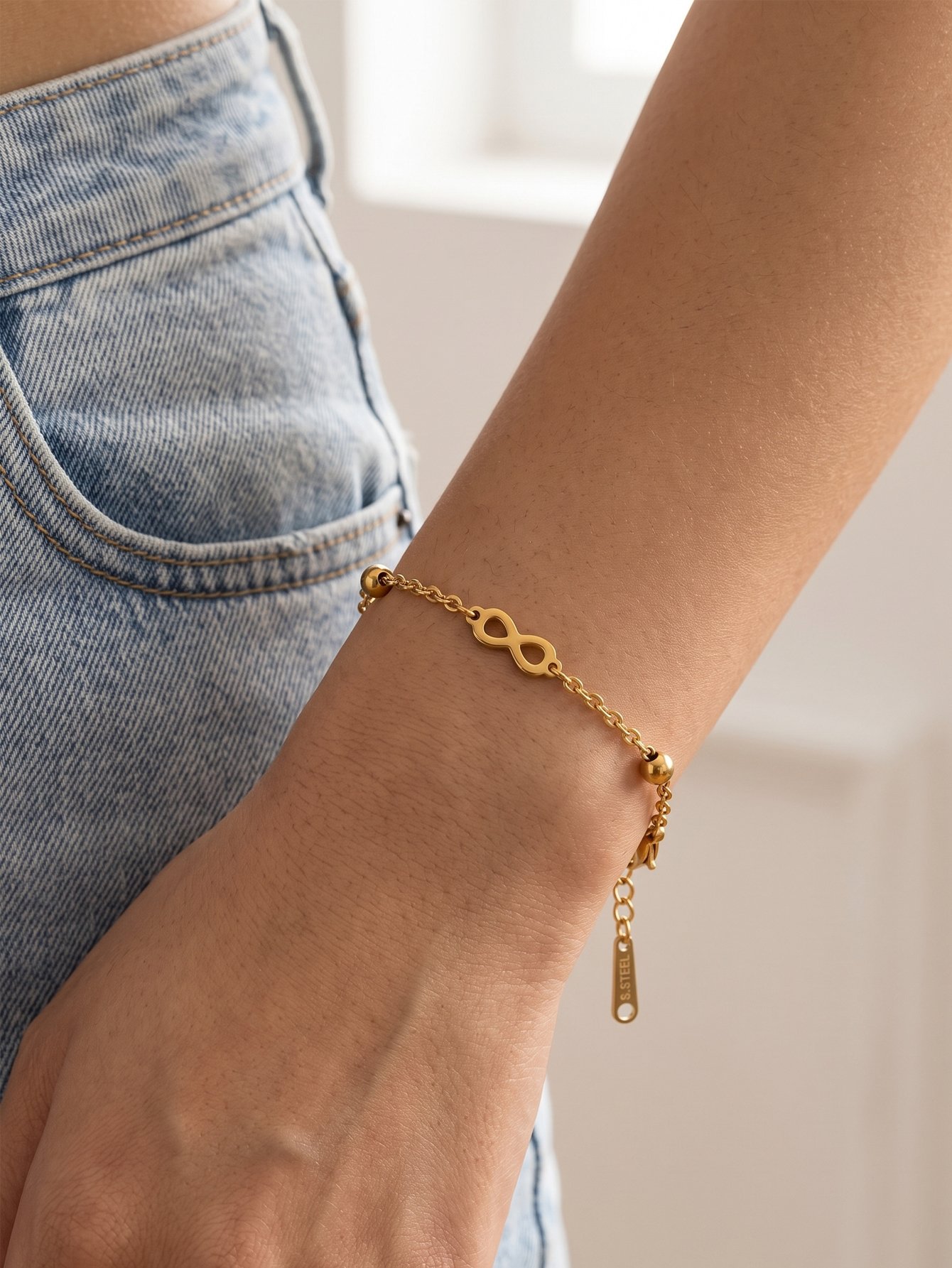 Gold Infinity Charm Bracelet for Women - Casual and Stylish.