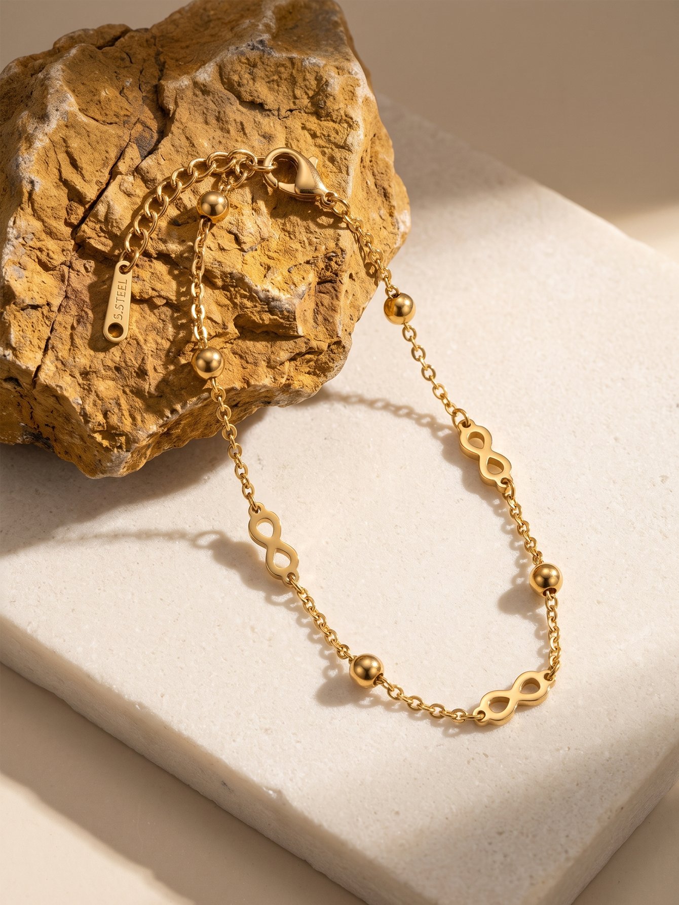Gold Infinity Charm Bracelet for Women - Casual and Stylish.