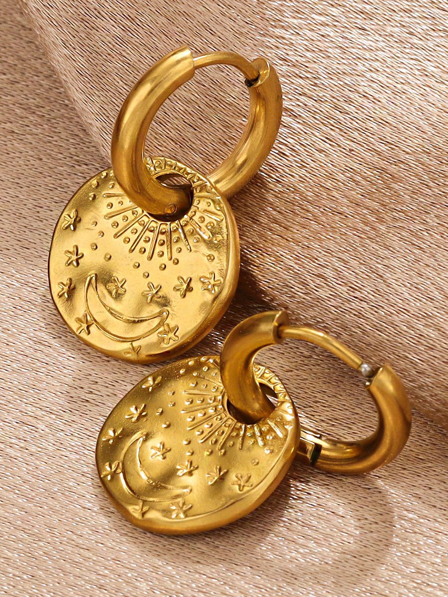 Gold Crescent Moon and Star Charm Hoop Earrings.