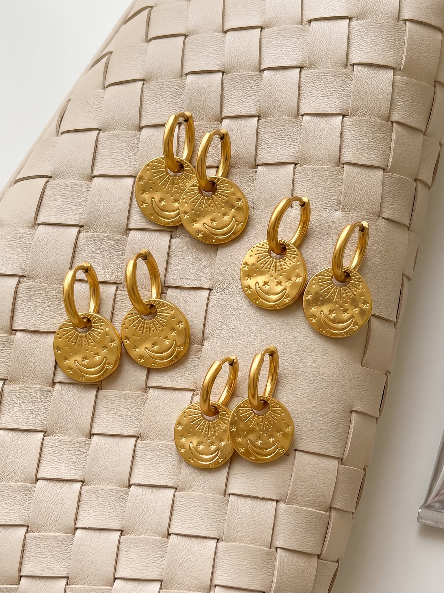 Gold Crescent Moon and Star Charm Hoop Earrings.