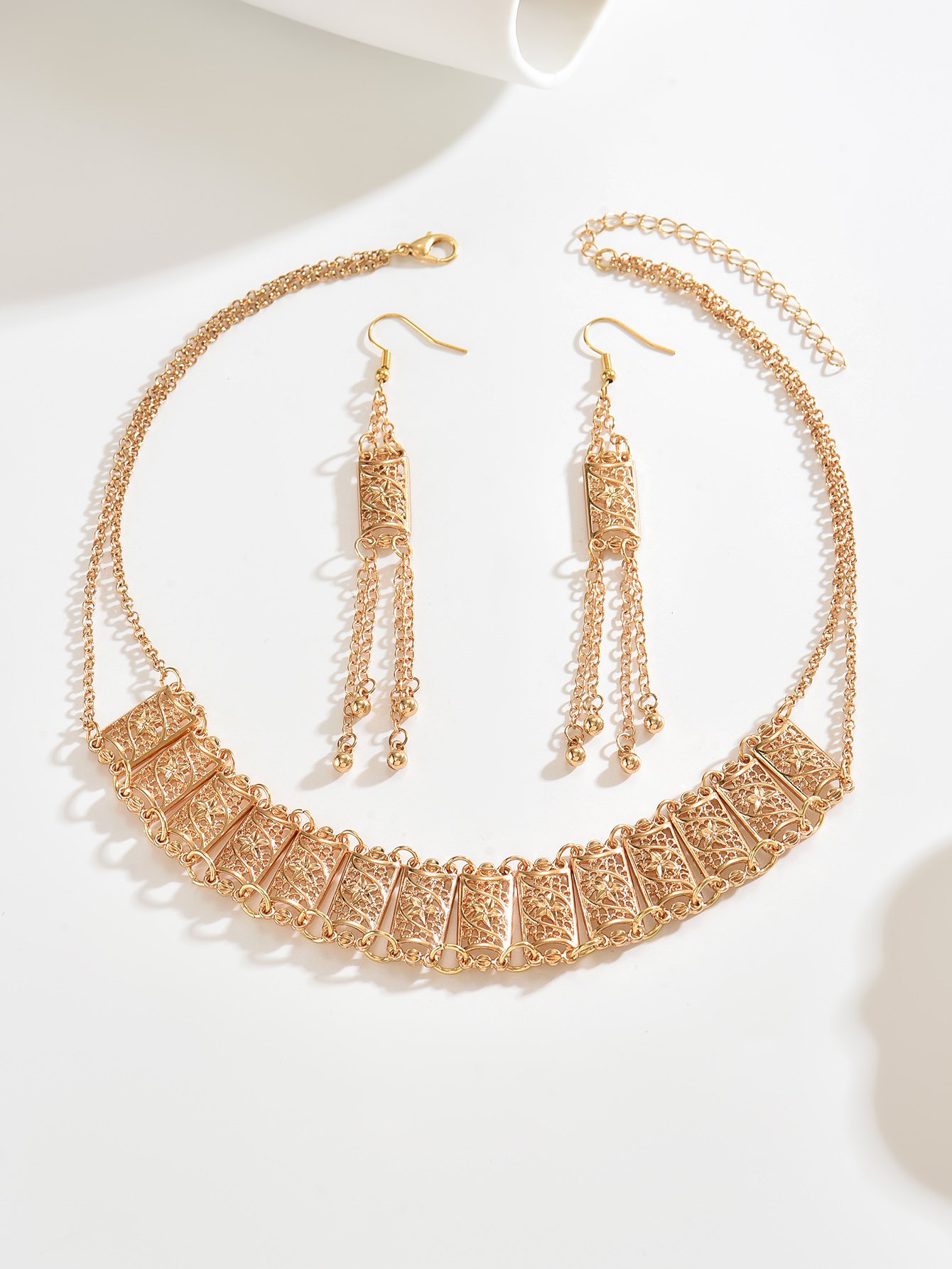 Golden Filigree Bib Necklace and Tassel Earrings Set