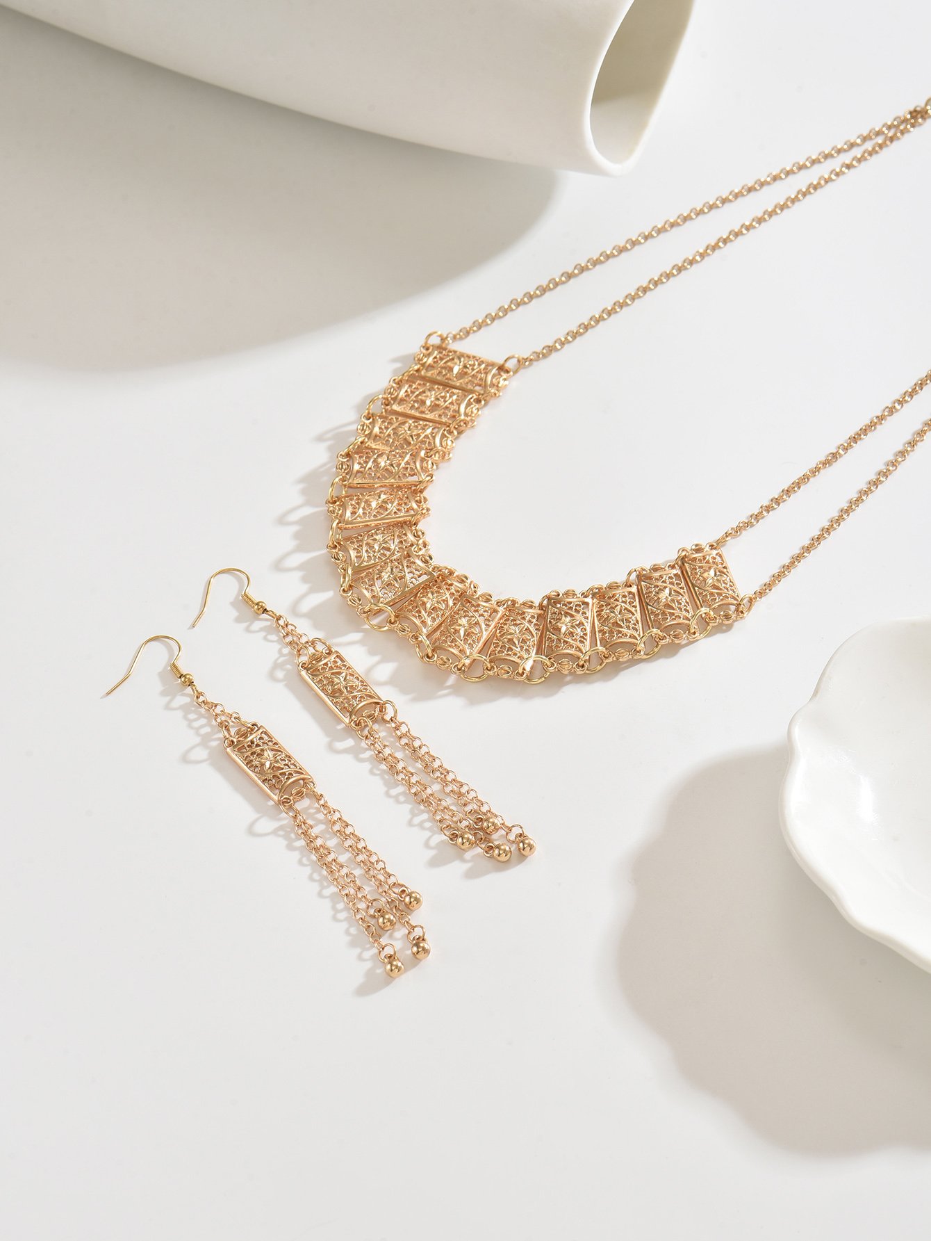 Golden Filigree Bib Necklace and Tassel Earrings Set