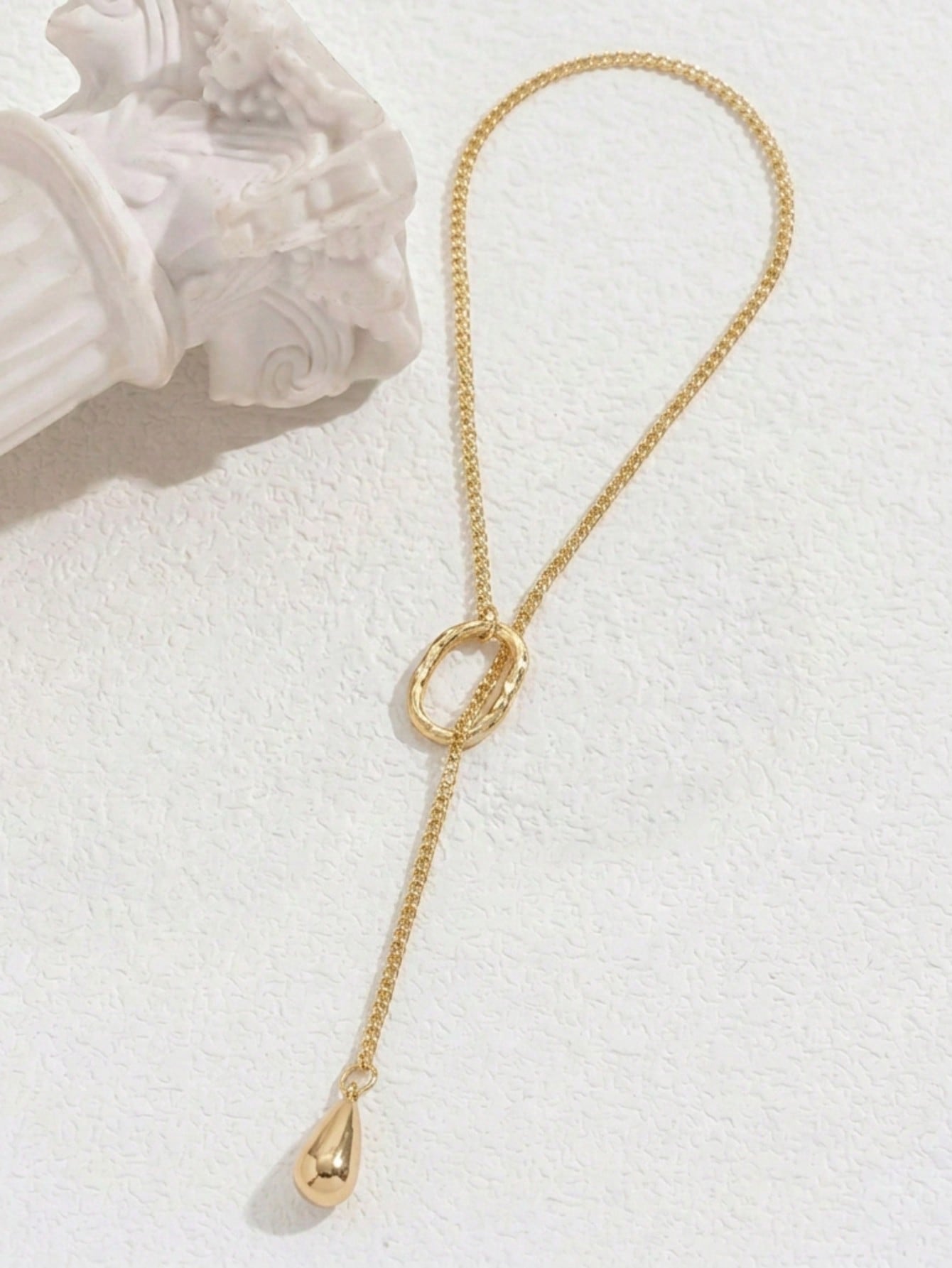 Gold Y-Lariat Necklace with Textured Oval and Teardrop Charm
