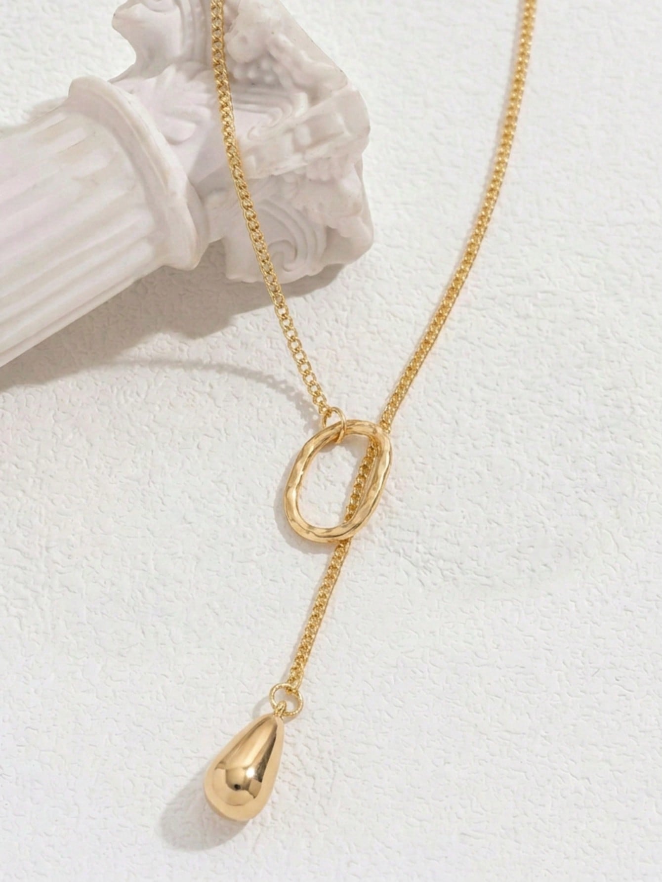 Gold Y-Lariat Necklace with Textured Oval and Teardrop Charm