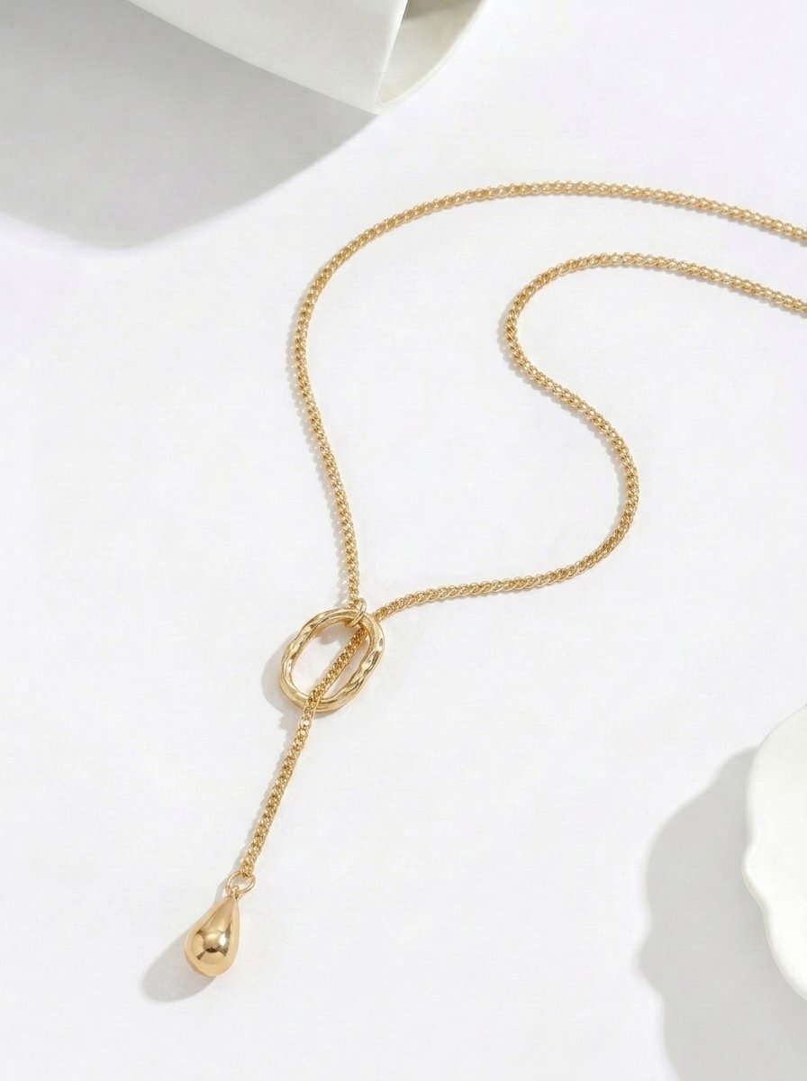 Gold Y-Lariat Necklace with Textured Oval and Teardrop Charm