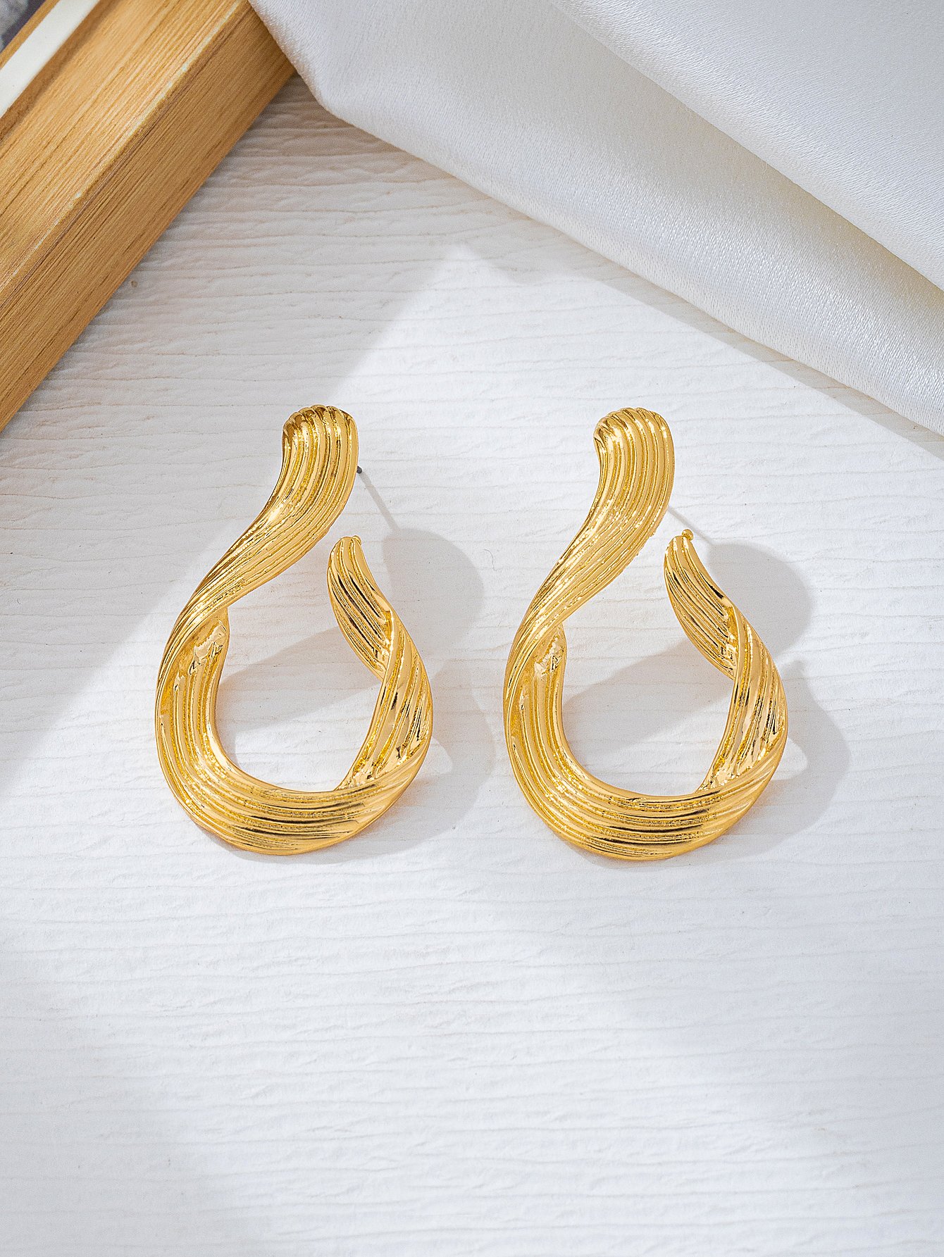 Gold Tone Twist Drop Earrings