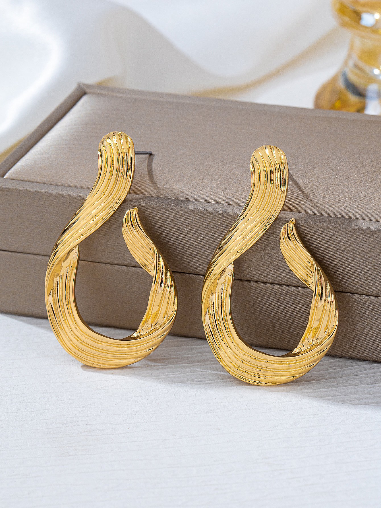 Gold Tone Twist Drop Earrings
