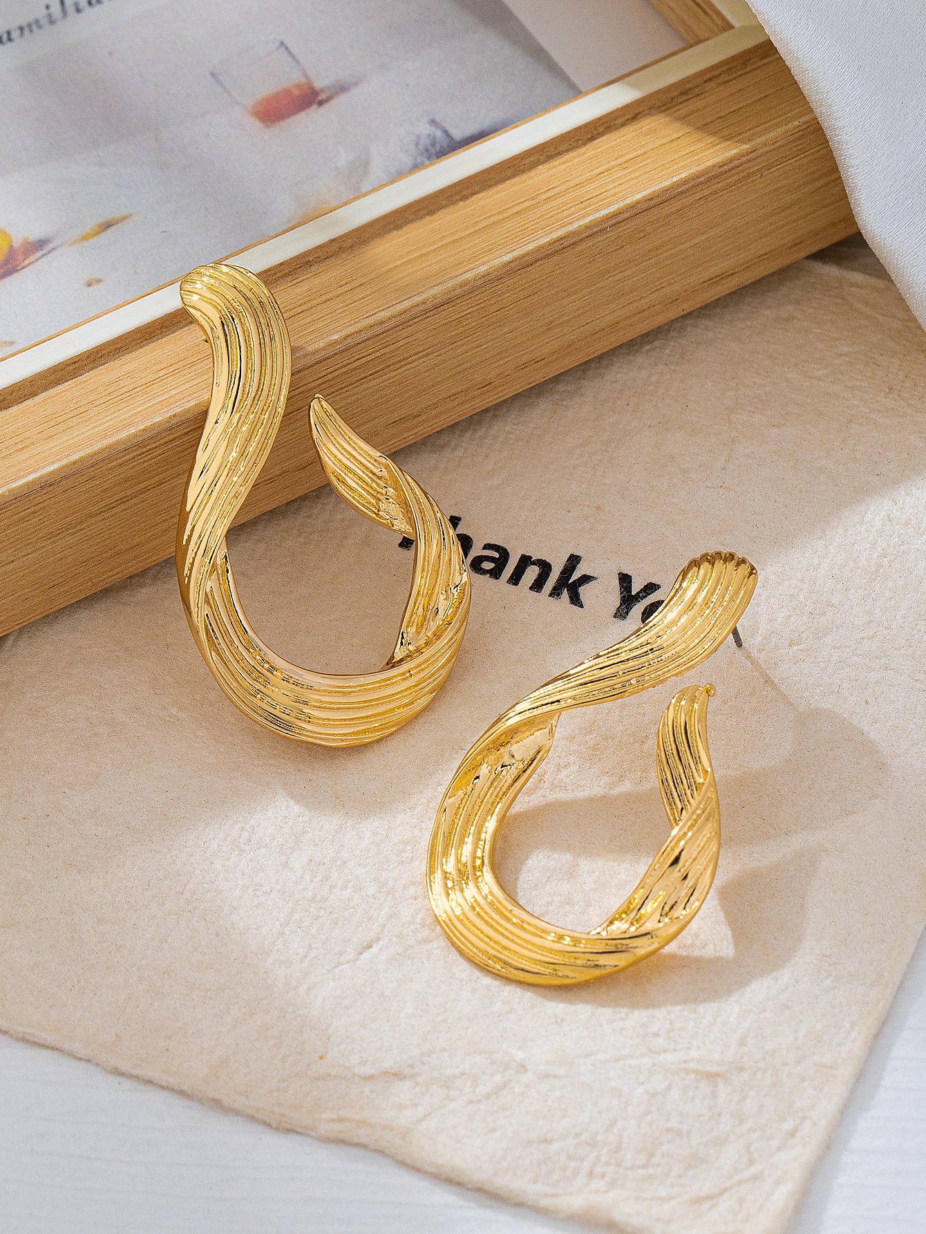 Gold Tone Twist Drop Earrings