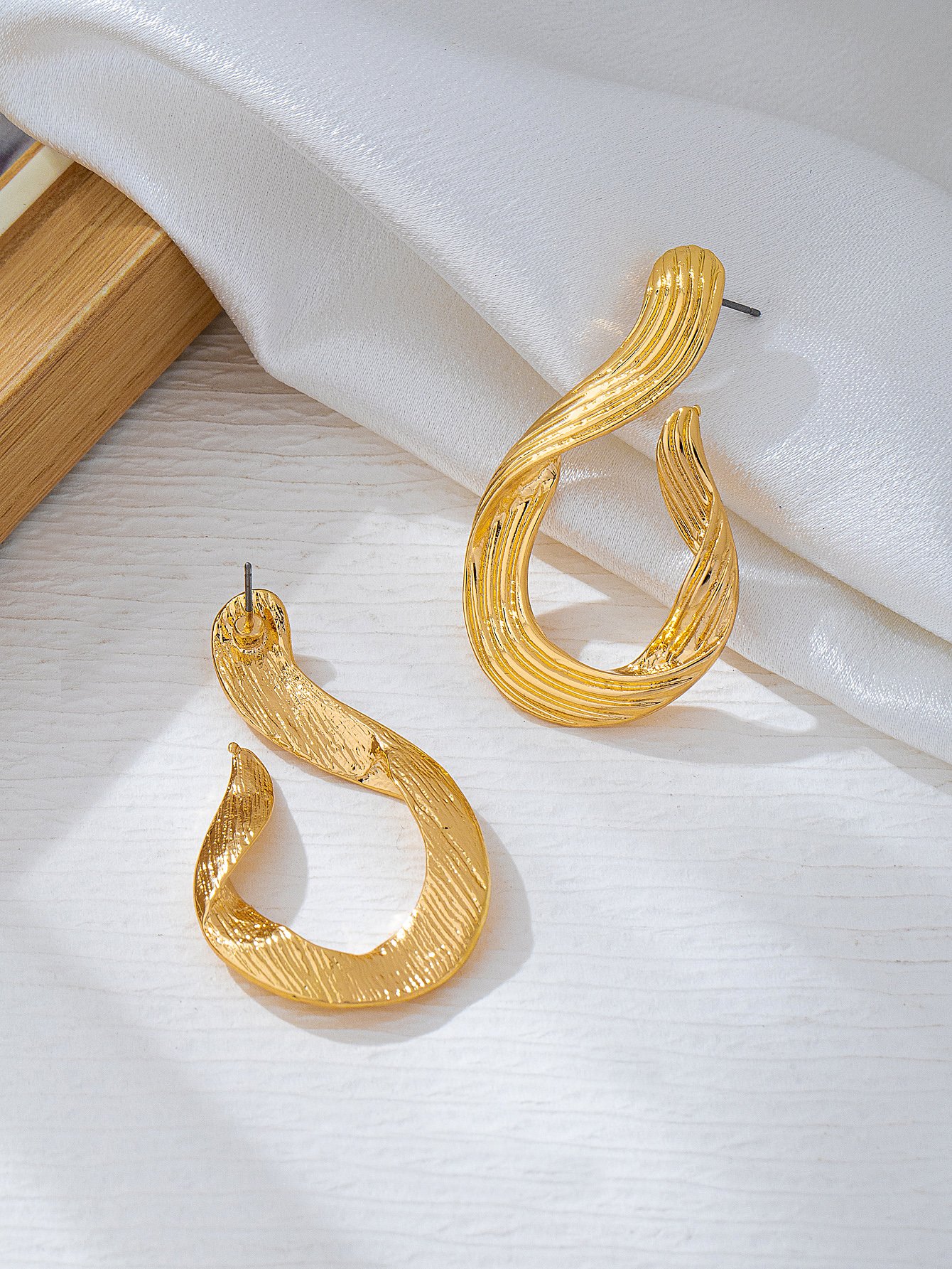 Gold Tone Twist Drop Earrings