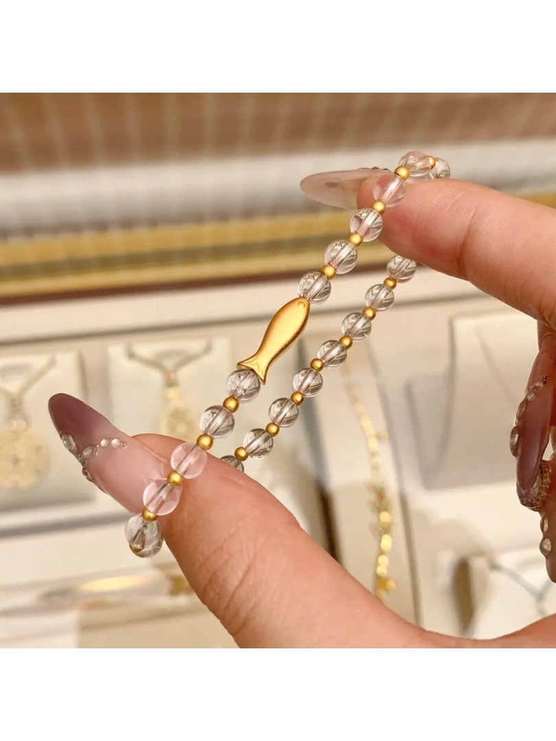سوار مطاطي بدلاية سمكة باللون الذهبي