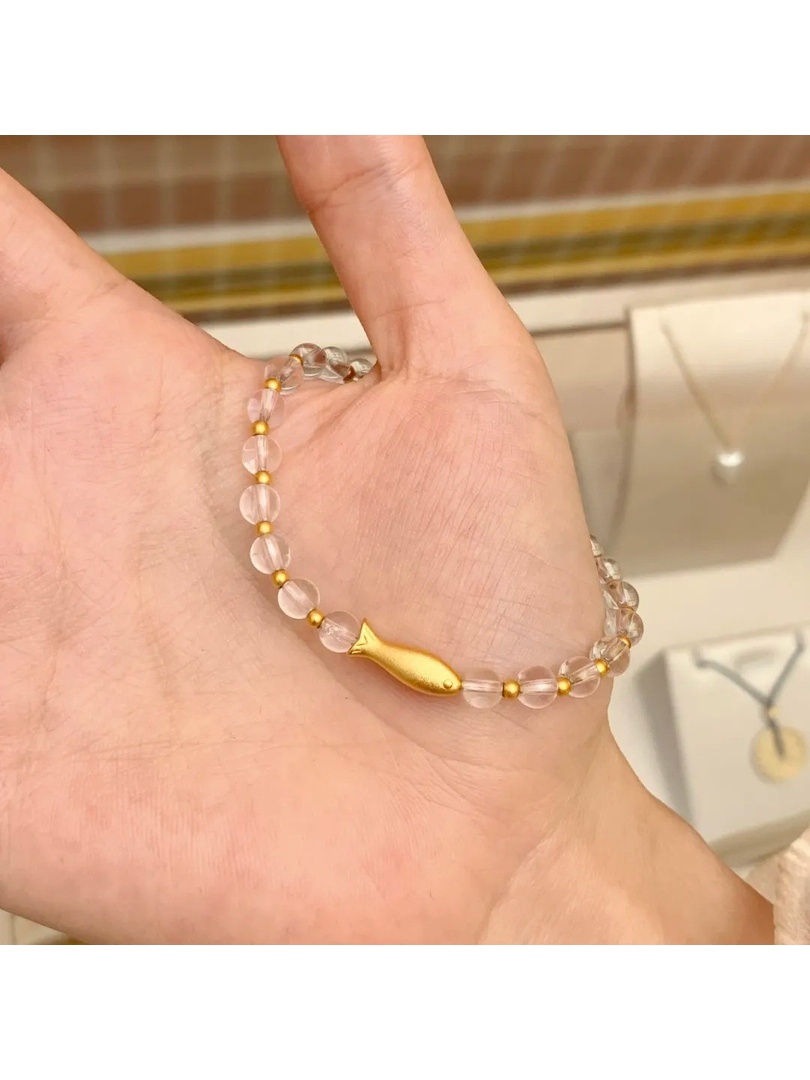 سوار مطاطي بدلاية سمكة باللون الذهبي