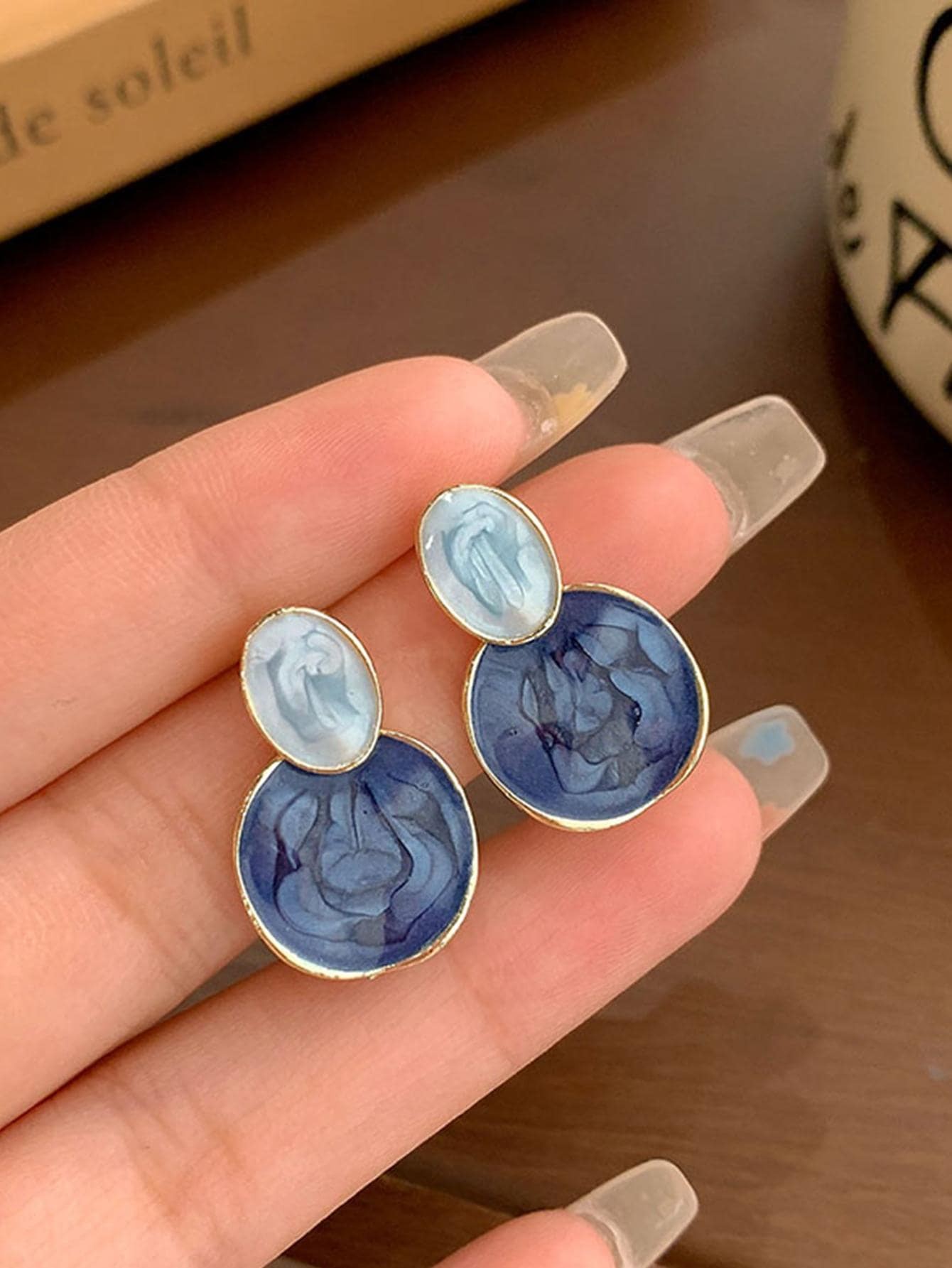 Casual Blue Enamel Drop Earrings for Women - Gold Plated Swirl Design.