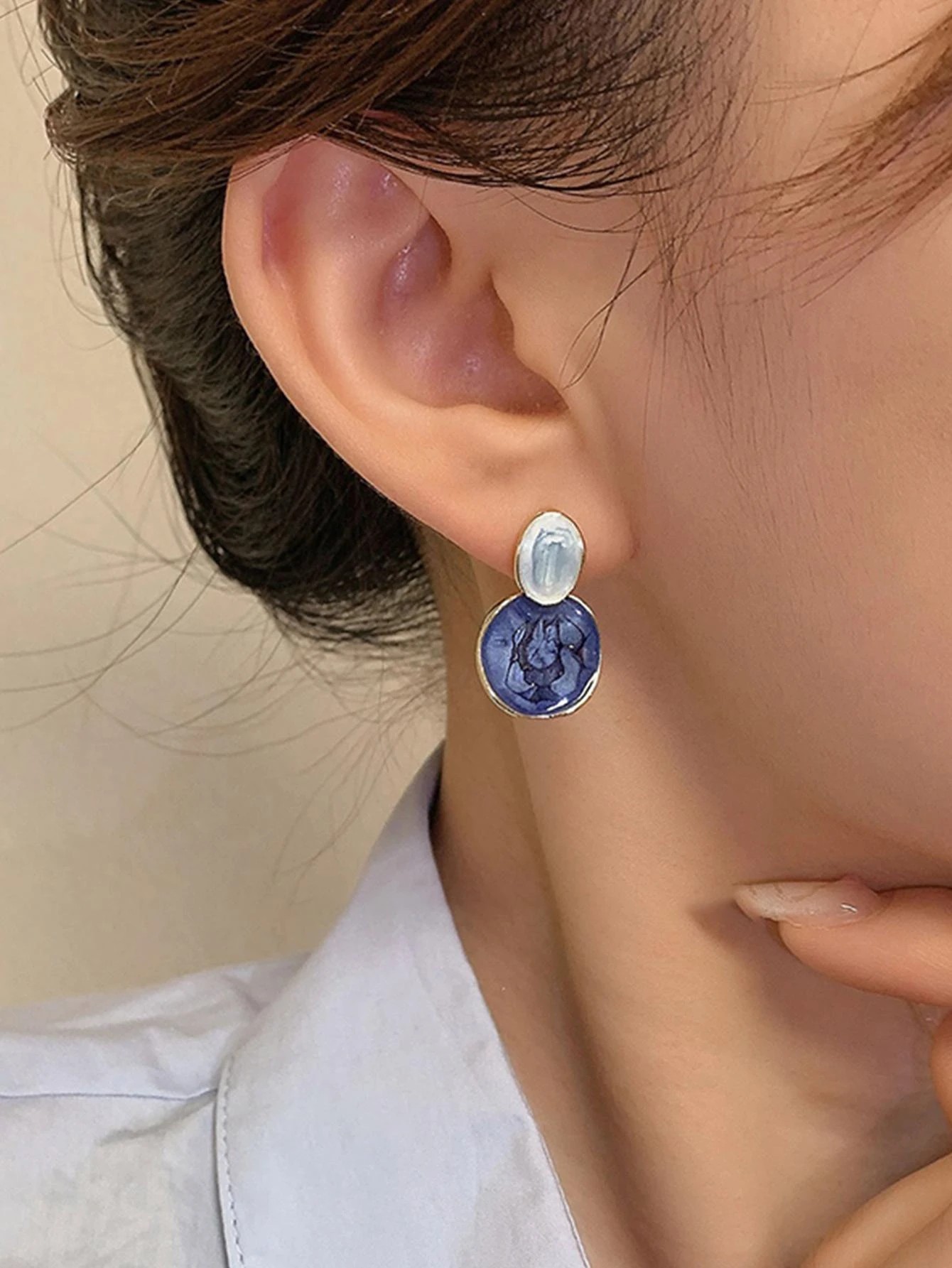 Casual Blue Enamel Drop Earrings for Women - Gold Plated Swirl Design.