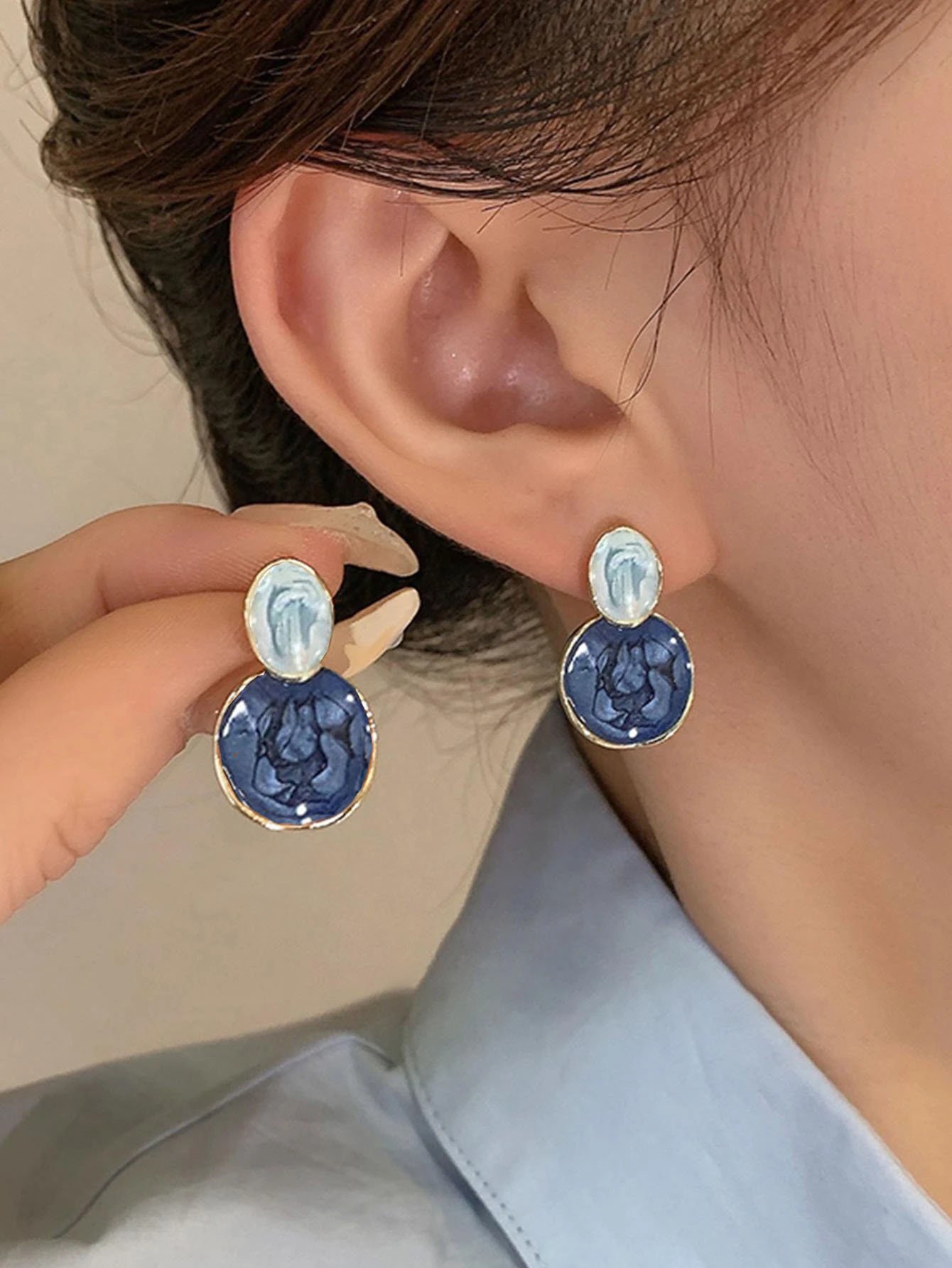 Casual Blue Enamel Drop Earrings for Women - Gold Plated Swirl Design.