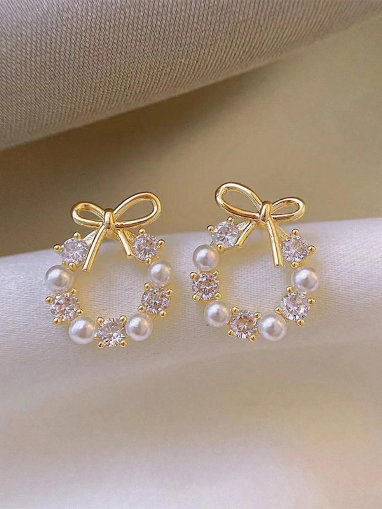 Gold Bowknot Pearl and Zircon Stud Earrings for Women - Casual Wear.