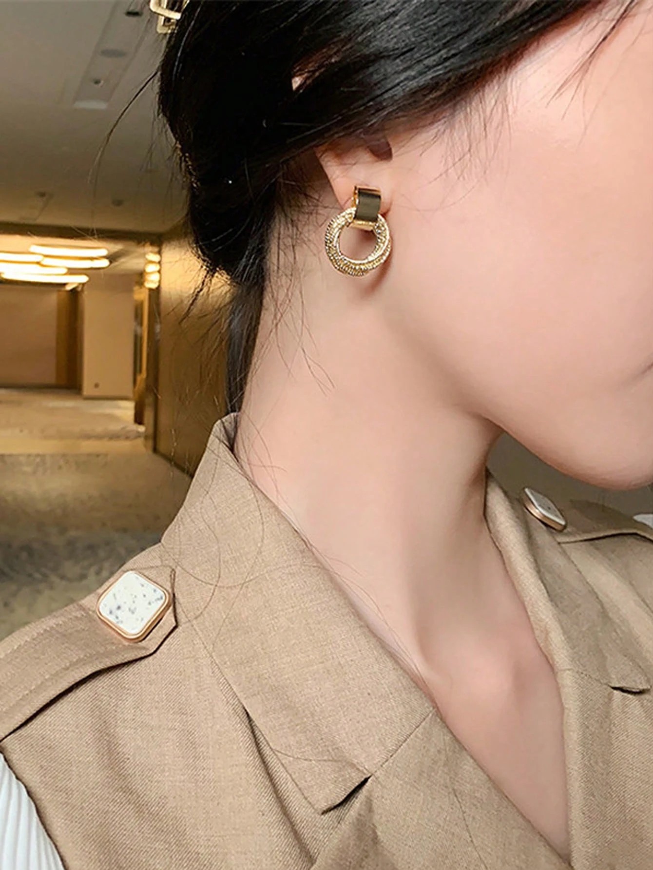 Gold Stud Earrings for Women - Casual Wear Twisted Circle Design.