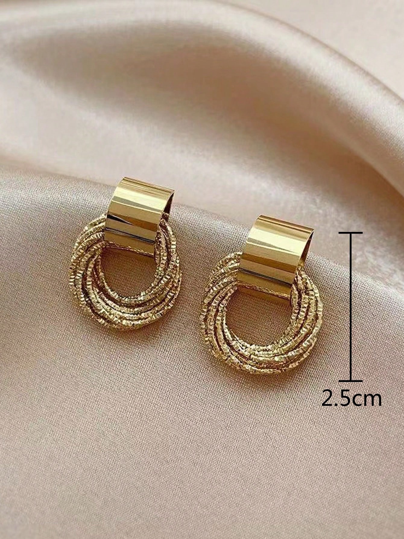Gold Stud Earrings for Women - Casual Wear Twisted Circle Design.