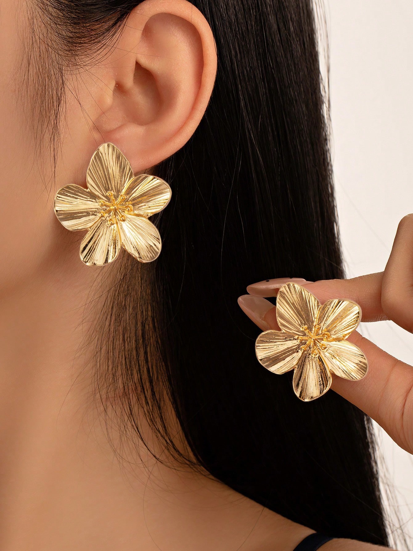Gold Blossom Stud Earrings for Everyday Wear.