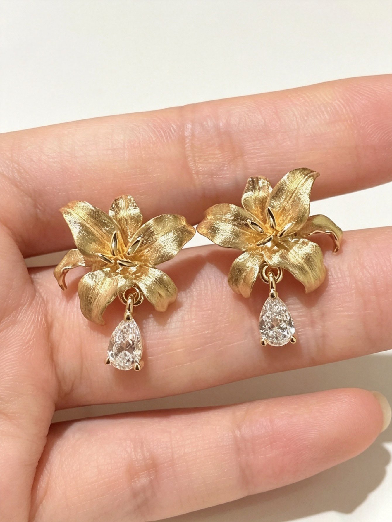 Golden Lily Stud Earrings with Zircon Drop - Casual Wear.