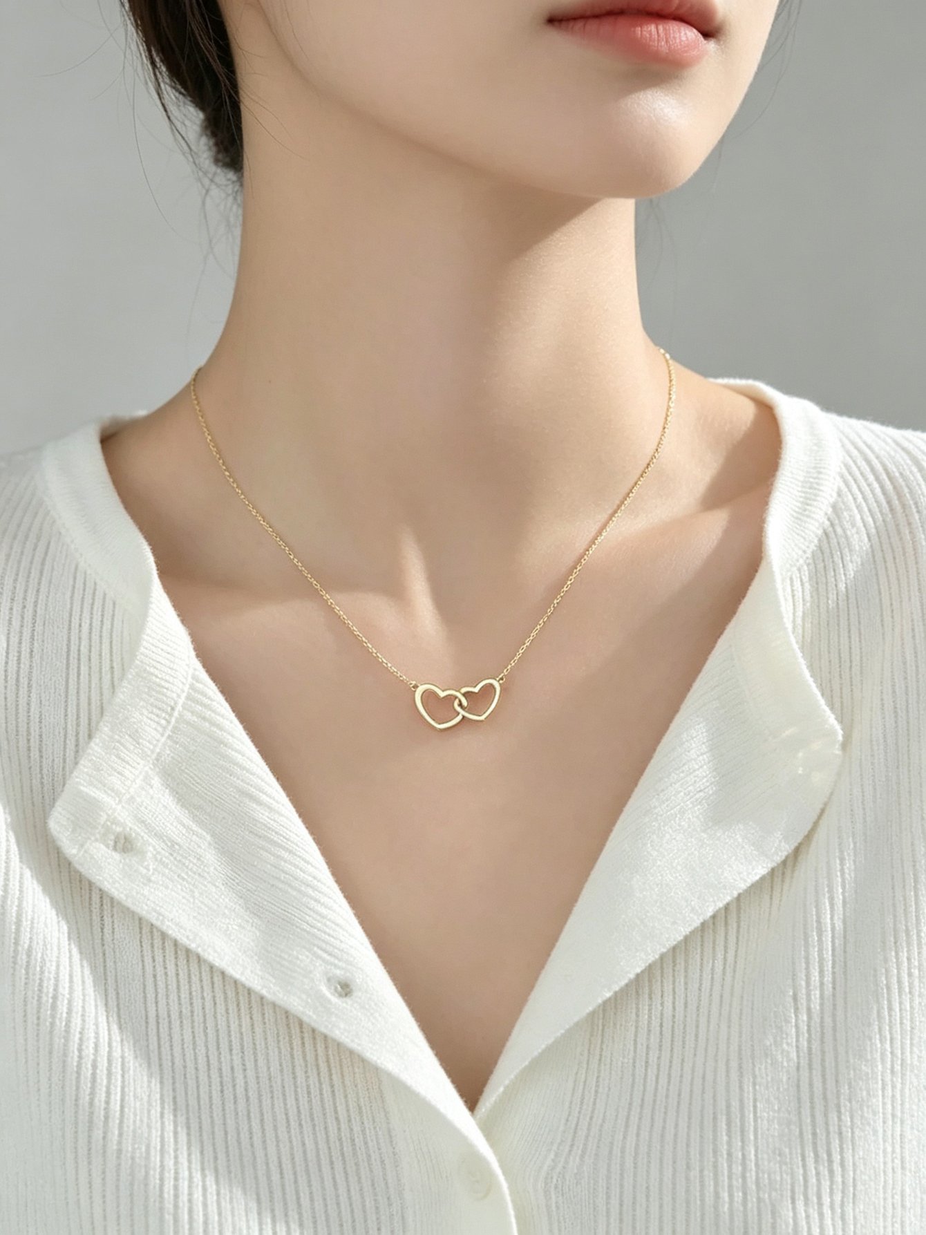 Gold Intertwined Heart Pendant Necklace