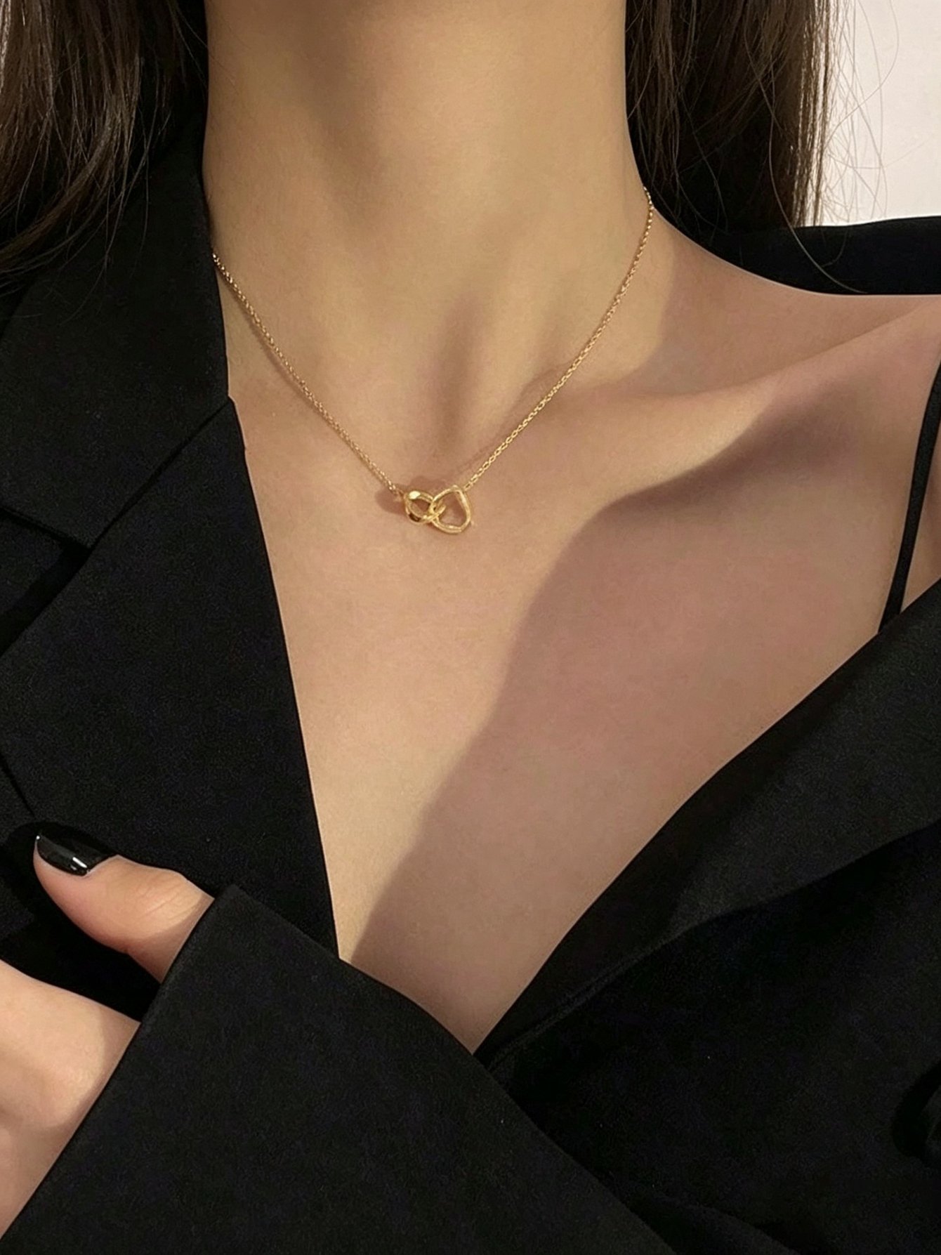 Gold Intertwined Heart Pendant Necklace