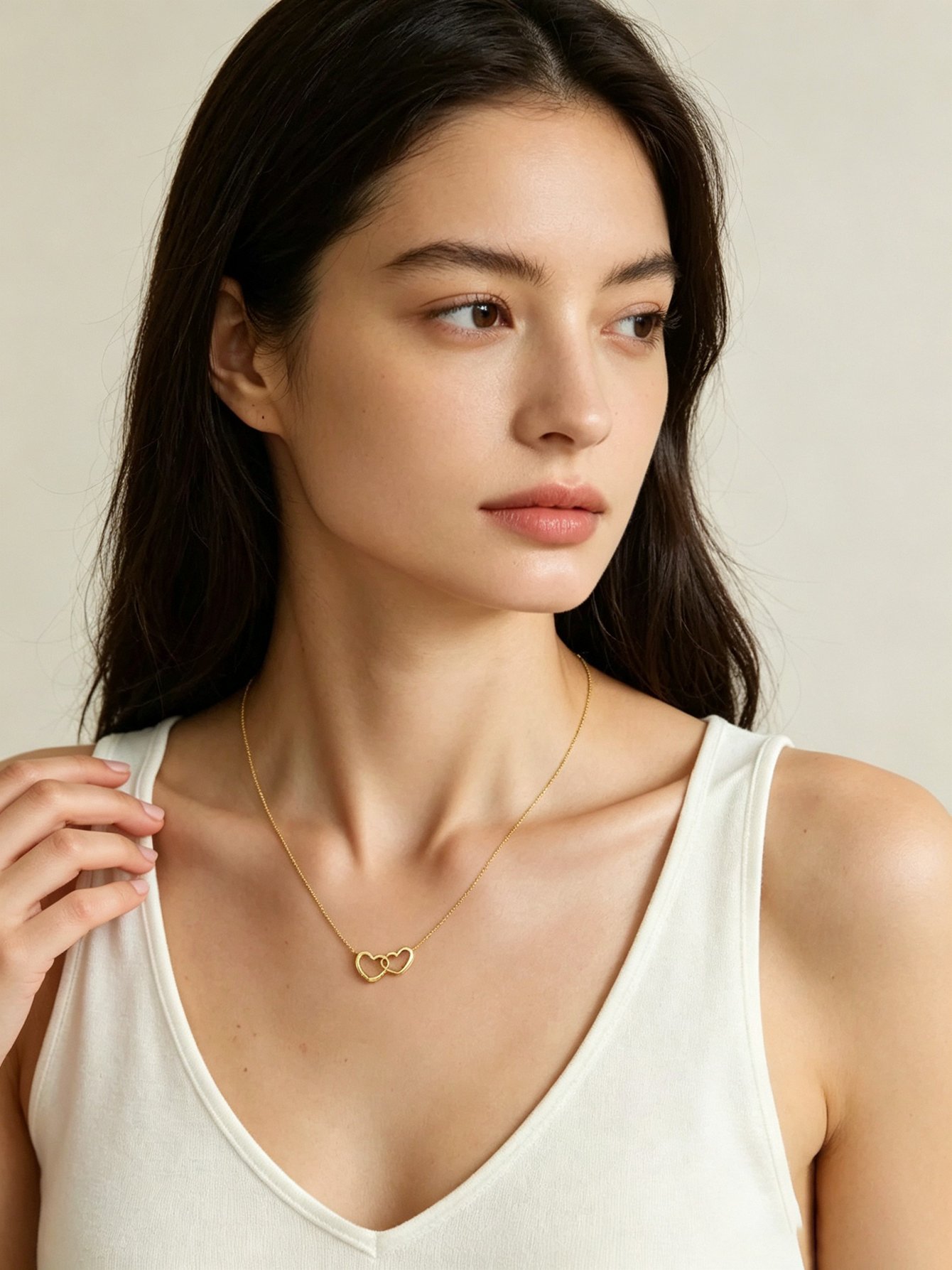 Gold Intertwined Heart Pendant Necklace