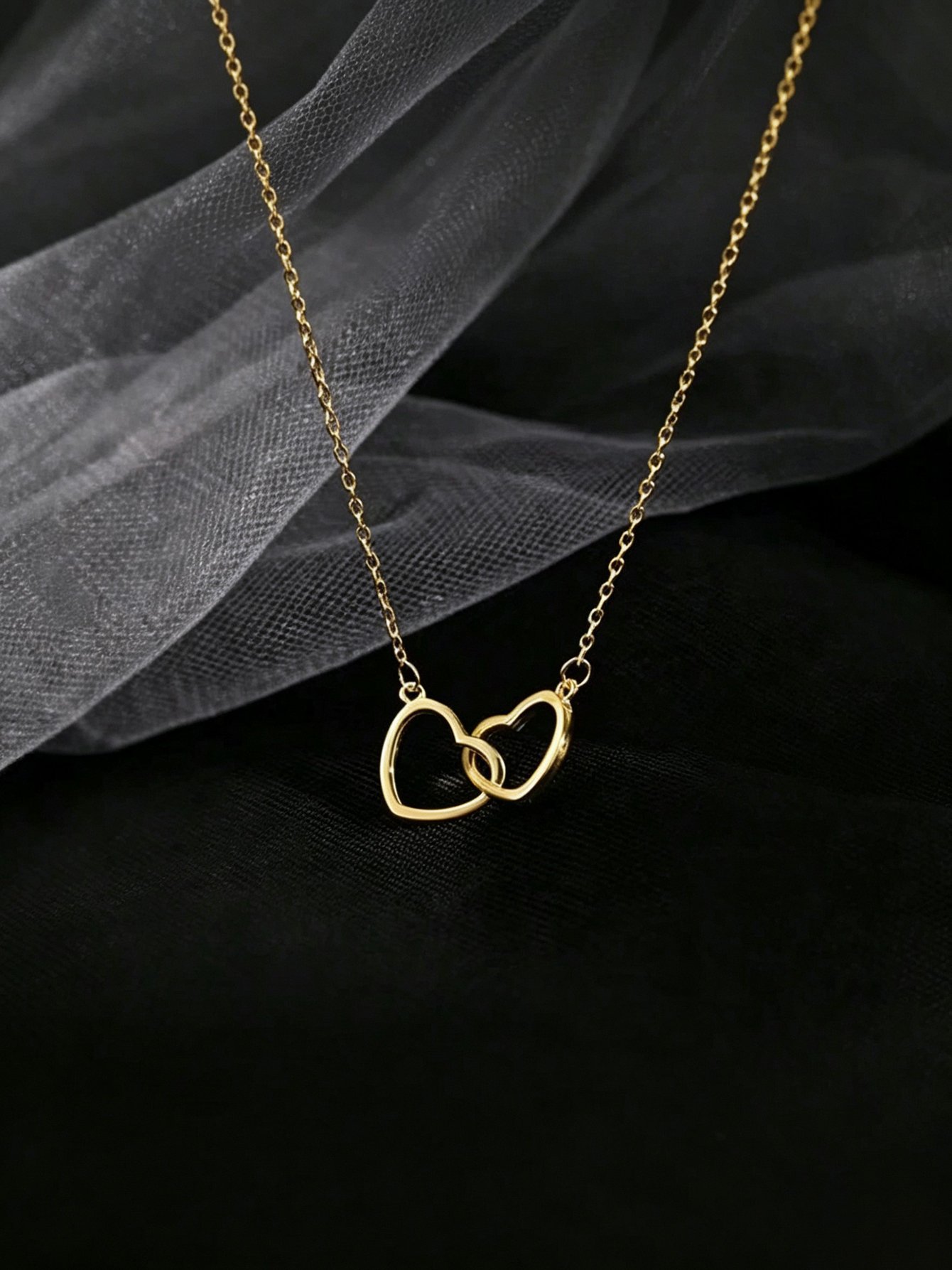 Gold Intertwined Heart Pendant Necklace