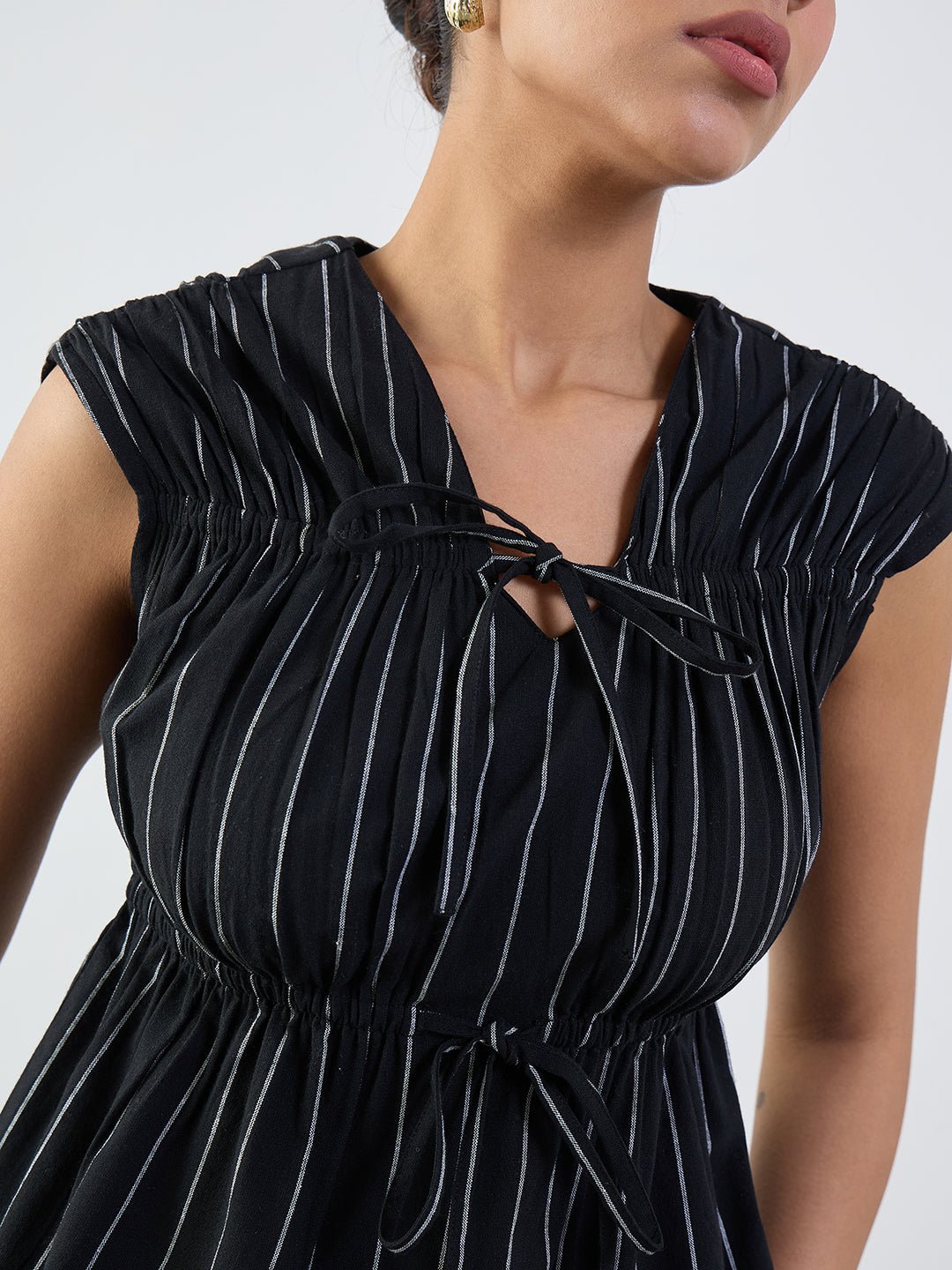 Black Sleeveless Striped Blouse with Tie-Up Detail