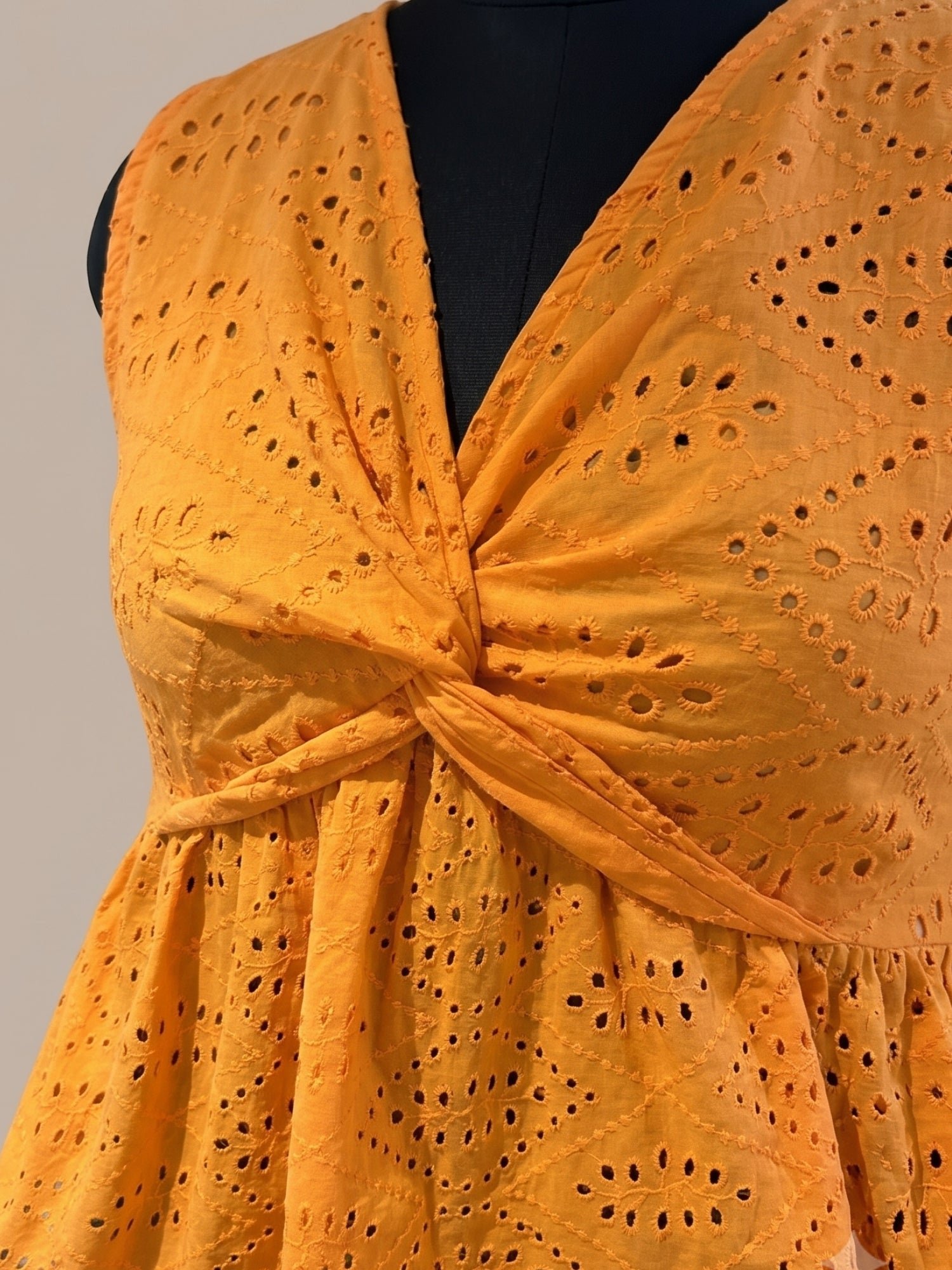 Orange Eyelet Knot-Front Sleeveless Blouse