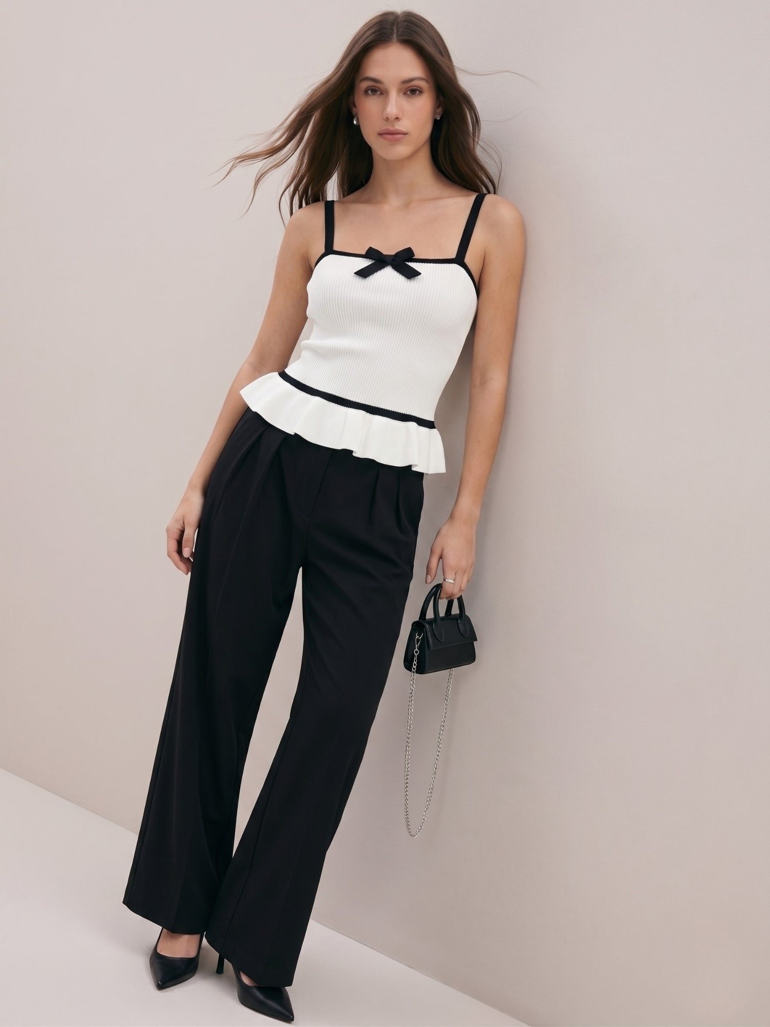 White Sleeveless Peplum Top with Contrast Bow