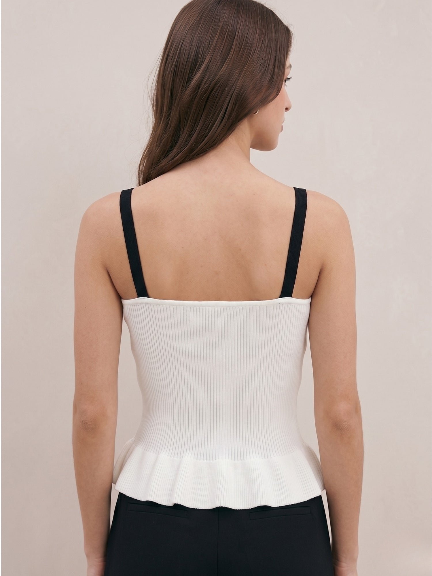 White Sleeveless Peplum Top with Contrast Bow