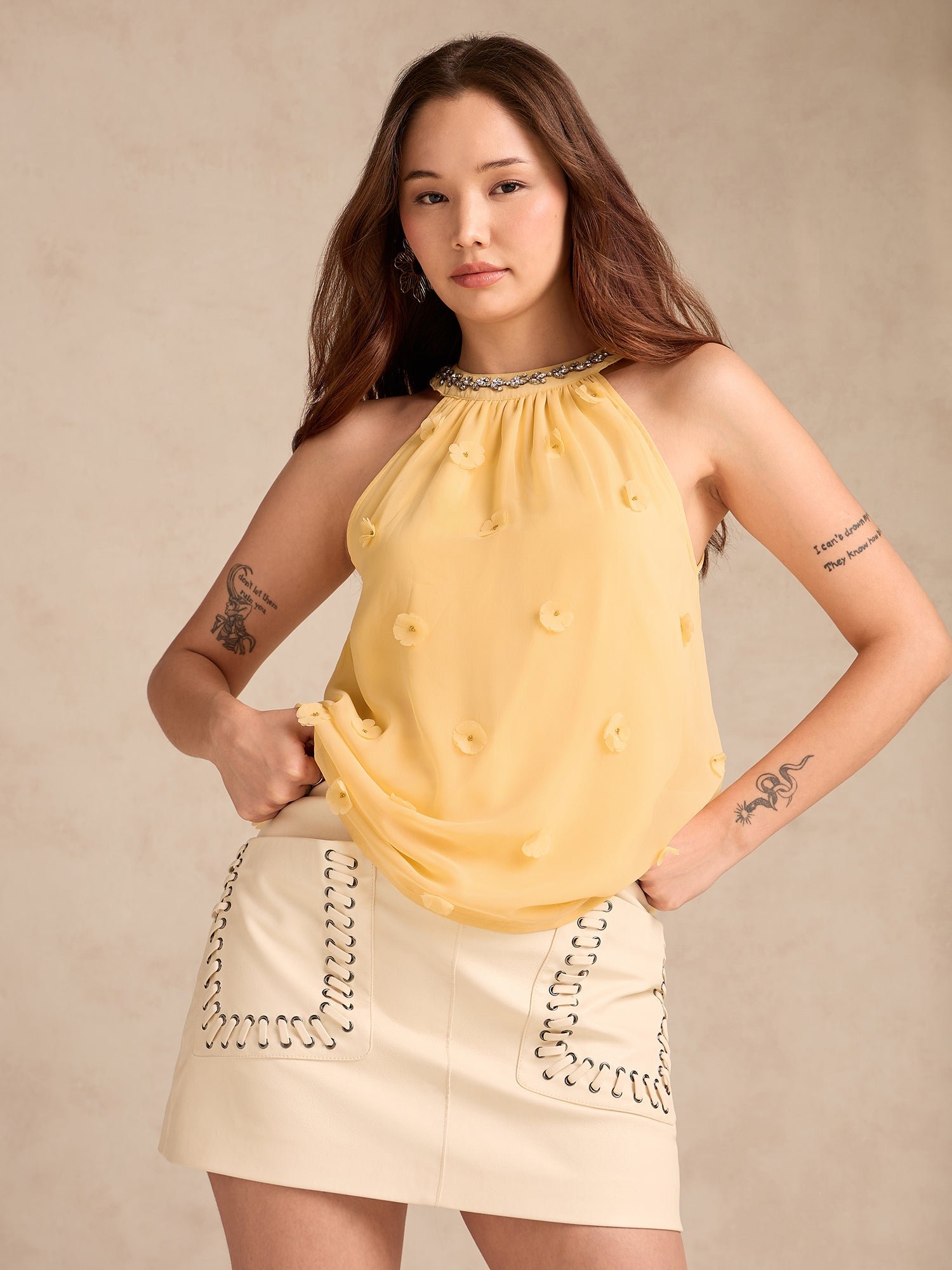 Yellow Sleeveless Blouse with 3D Floral Embellishments