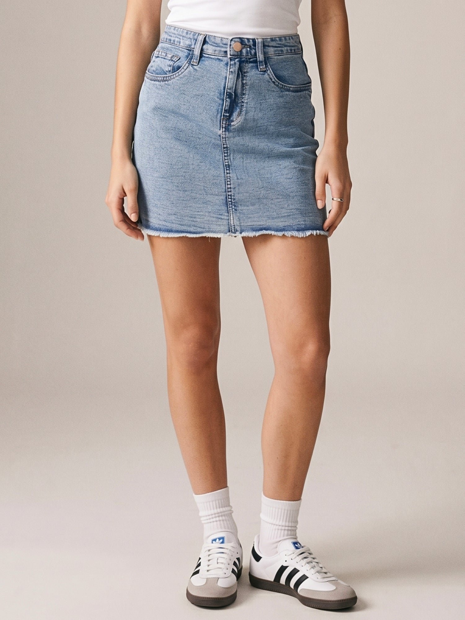Light Blue Mini Denim Skirt With Frayed Hem