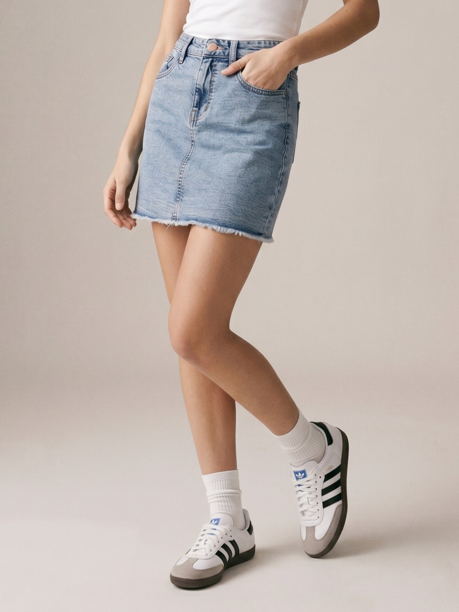 Light Blue Mini Denim Skirt With Frayed Hem