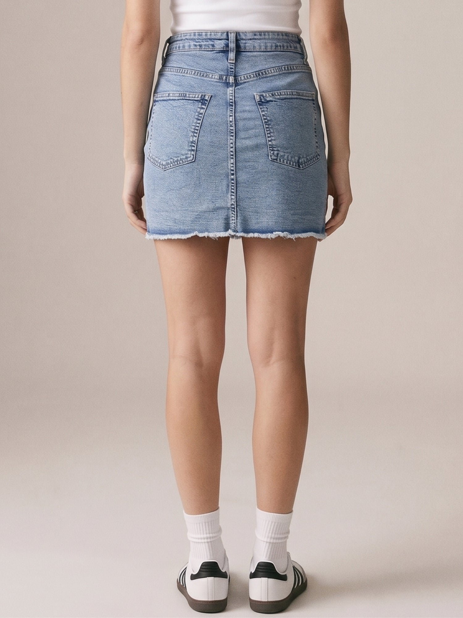Light Blue Mini Denim Skirt With Frayed Hem