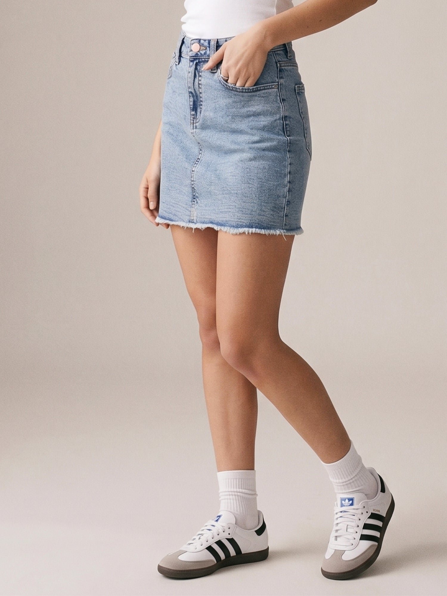 Light Blue Mini Denim Skirt With Frayed Hem