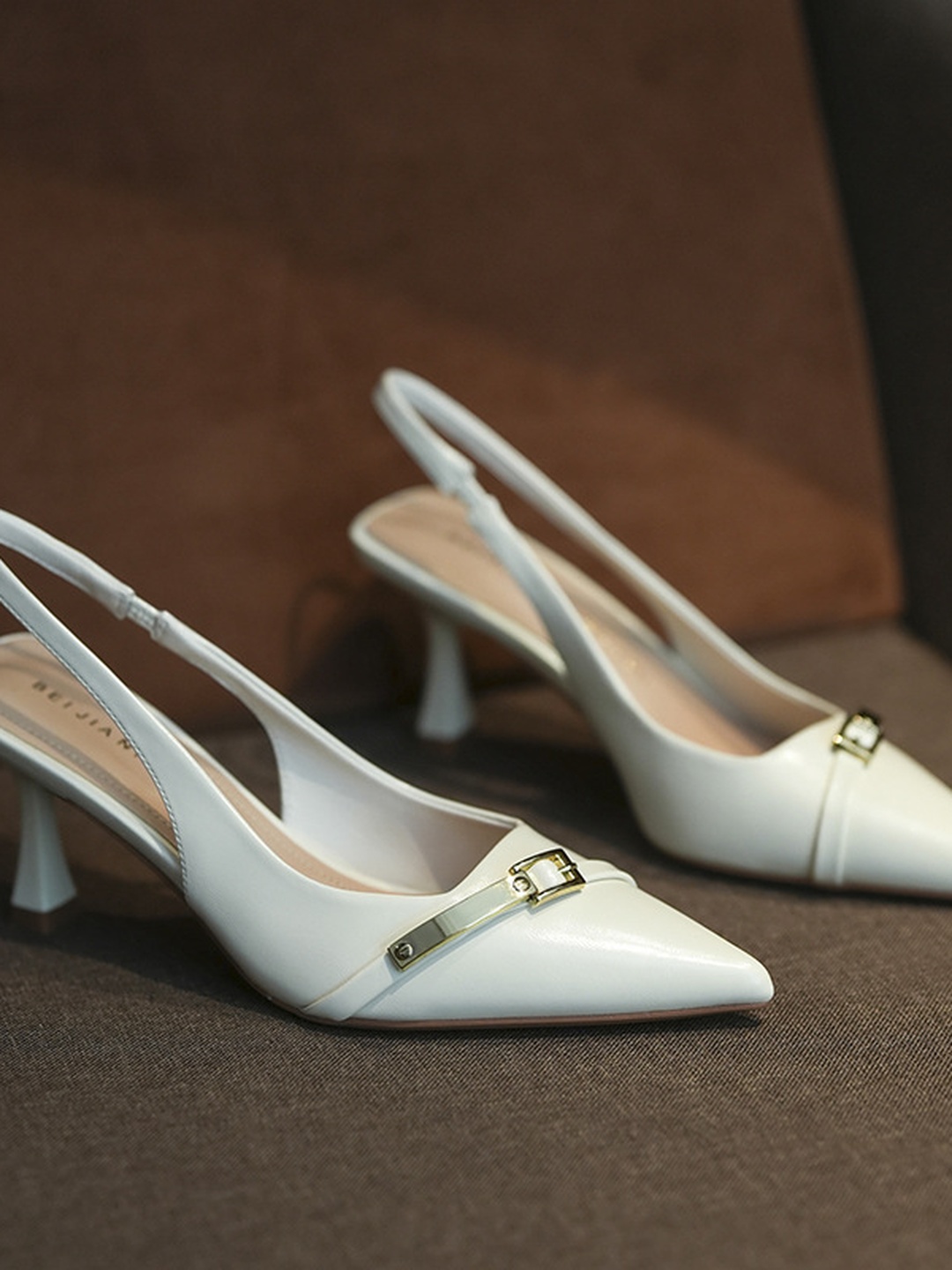 White Pointed-Toe Slingback Heels with Gold Buckle Detail