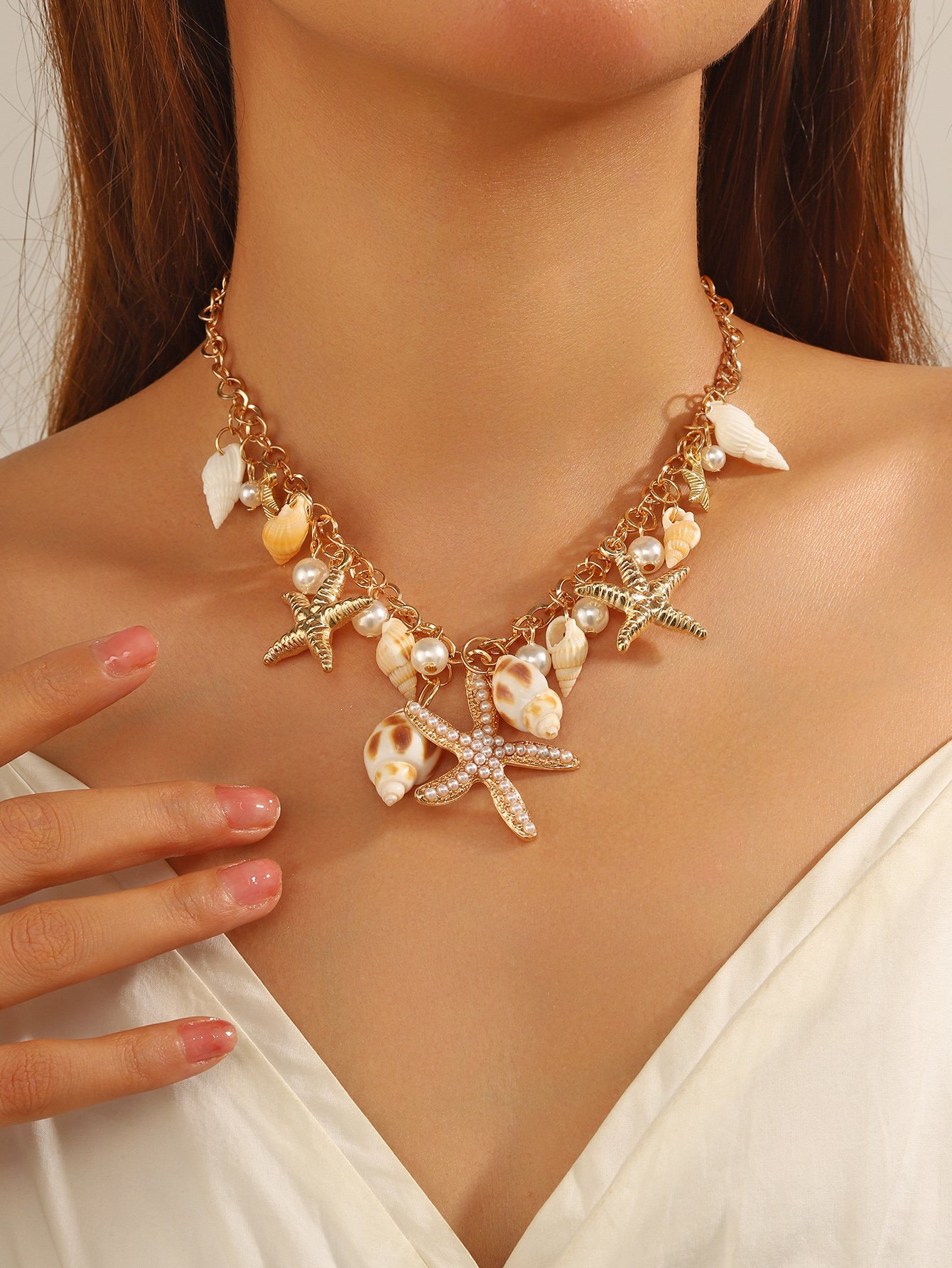 Gold Tone Seashell and Starfish Link Necklace