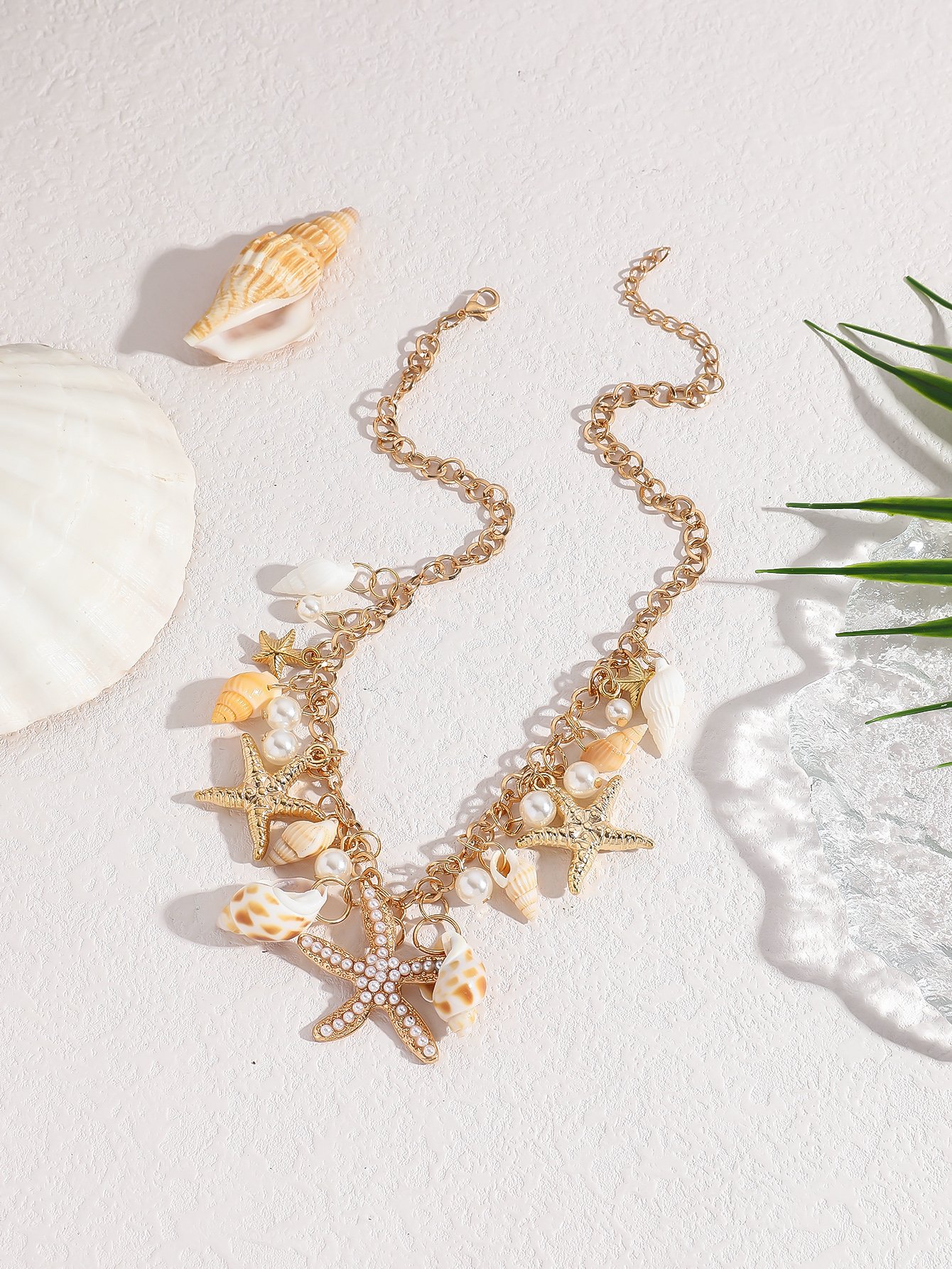 Gold Tone Seashell and Starfish Link Necklace