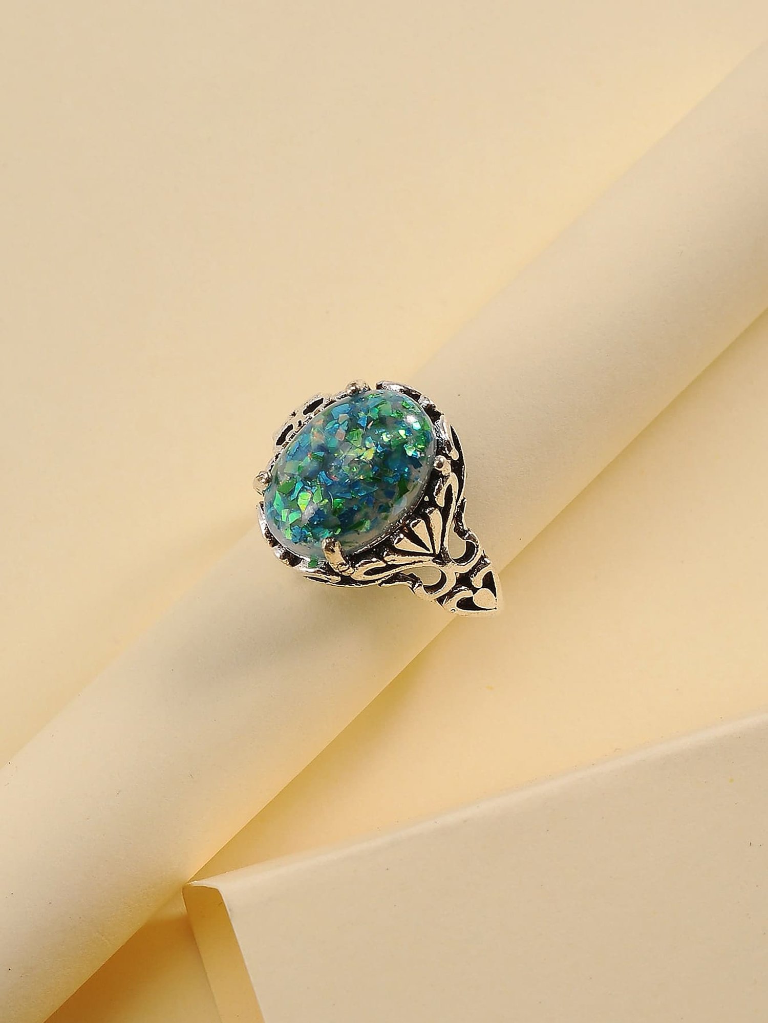 Silver Filigree Ring with Shimmering Teal Stone