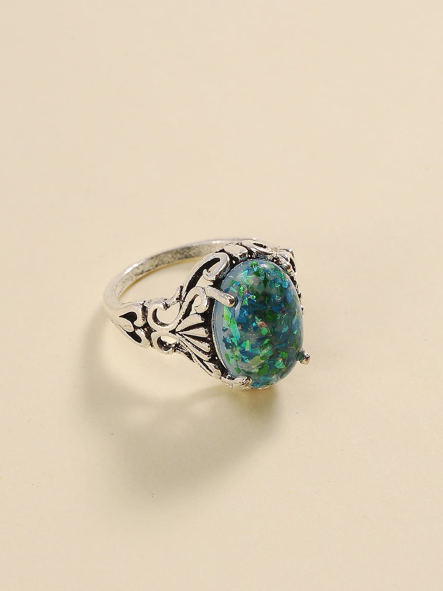 Silver Filigree Ring with Shimmering Teal Stone