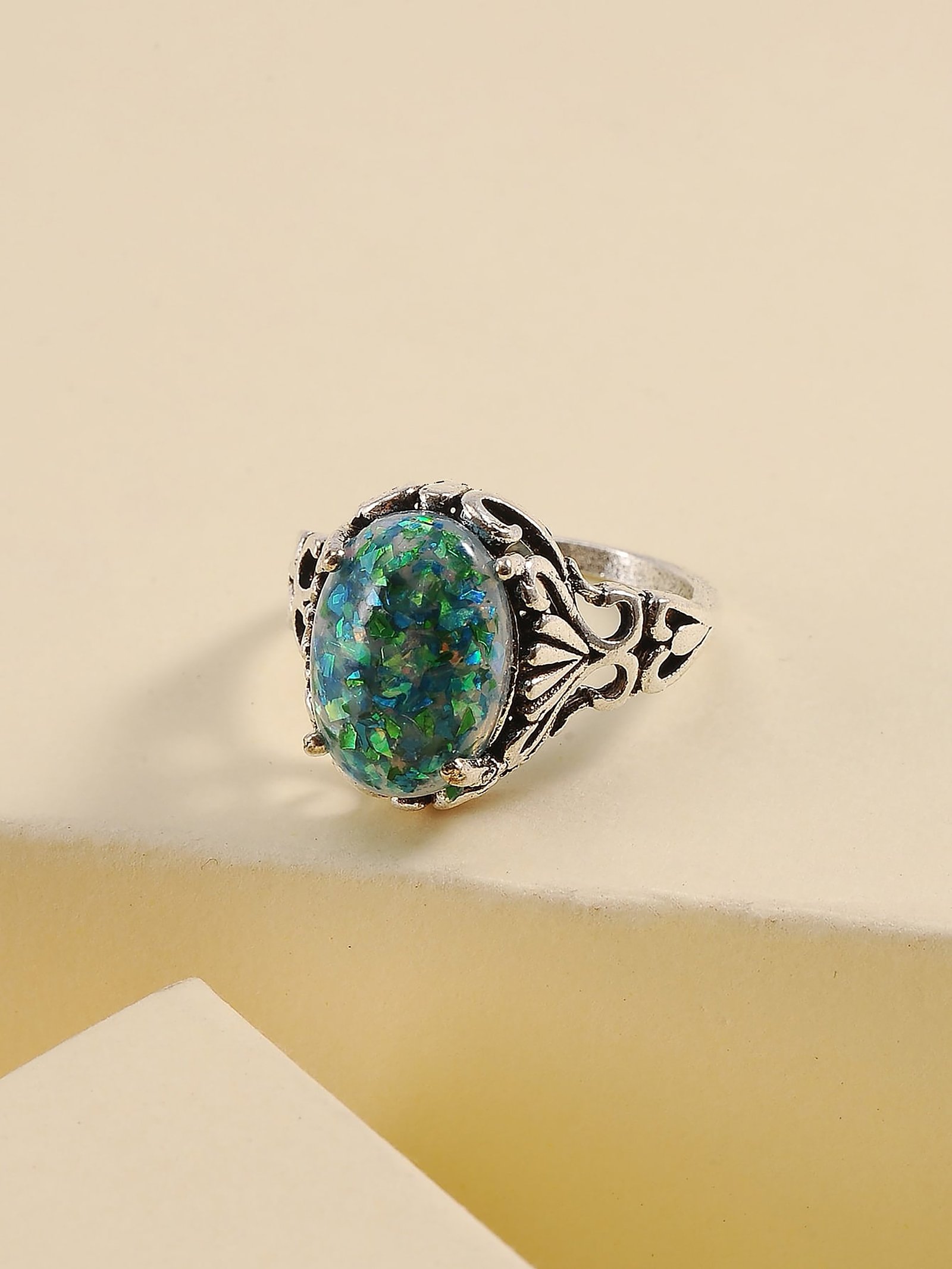 Silver Filigree Ring with Shimmering Teal Stone