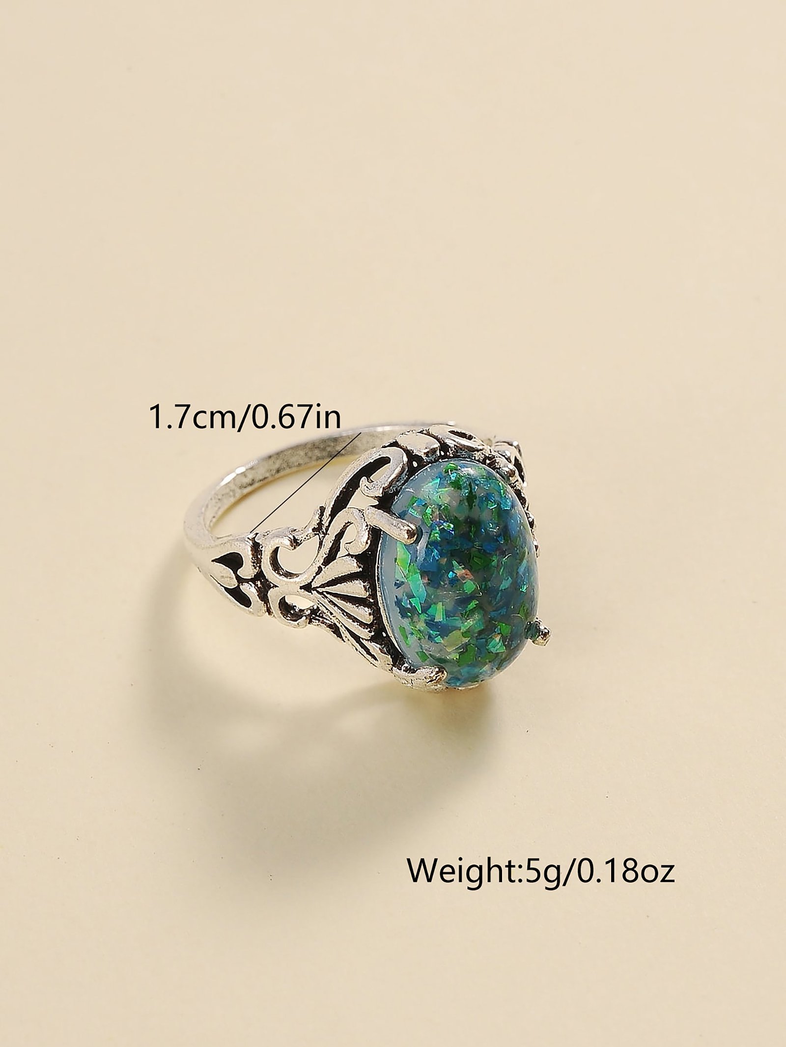 Silver Filigree Ring with Shimmering Teal Stone