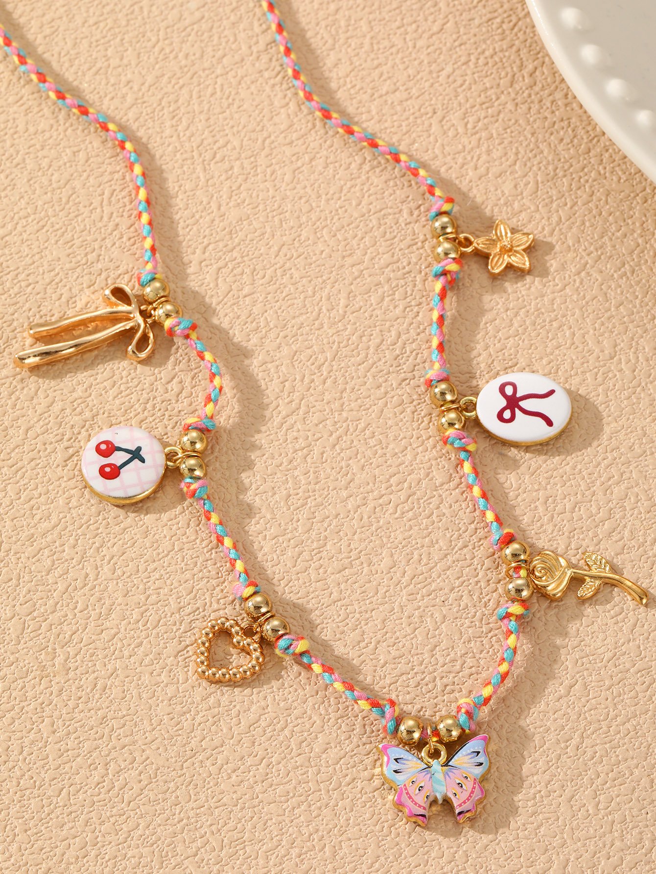 Charm Necklace with Multi-Colored Rope