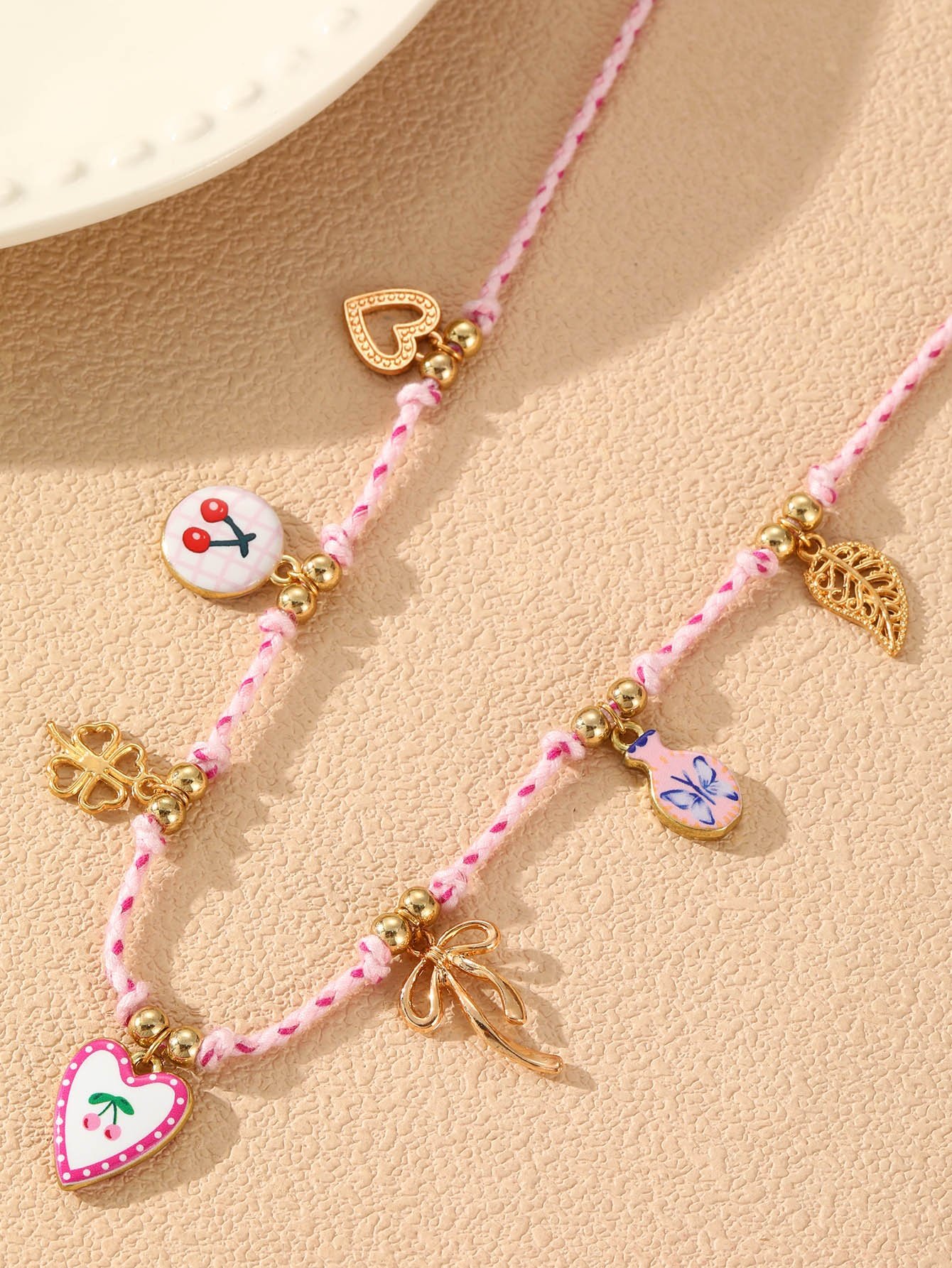Multi-Charm Braided Necklace
