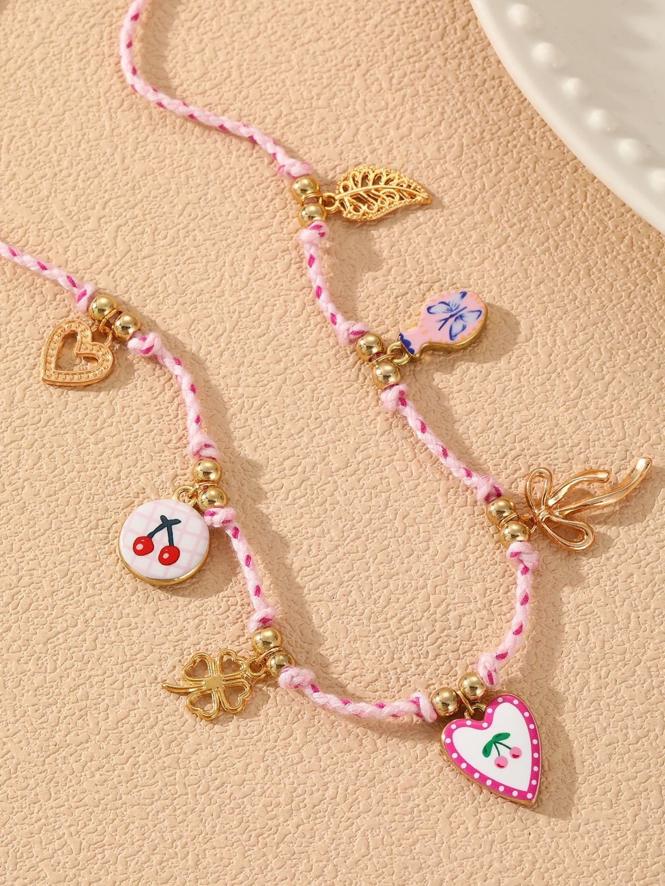 Multi-Charm Braided Necklace