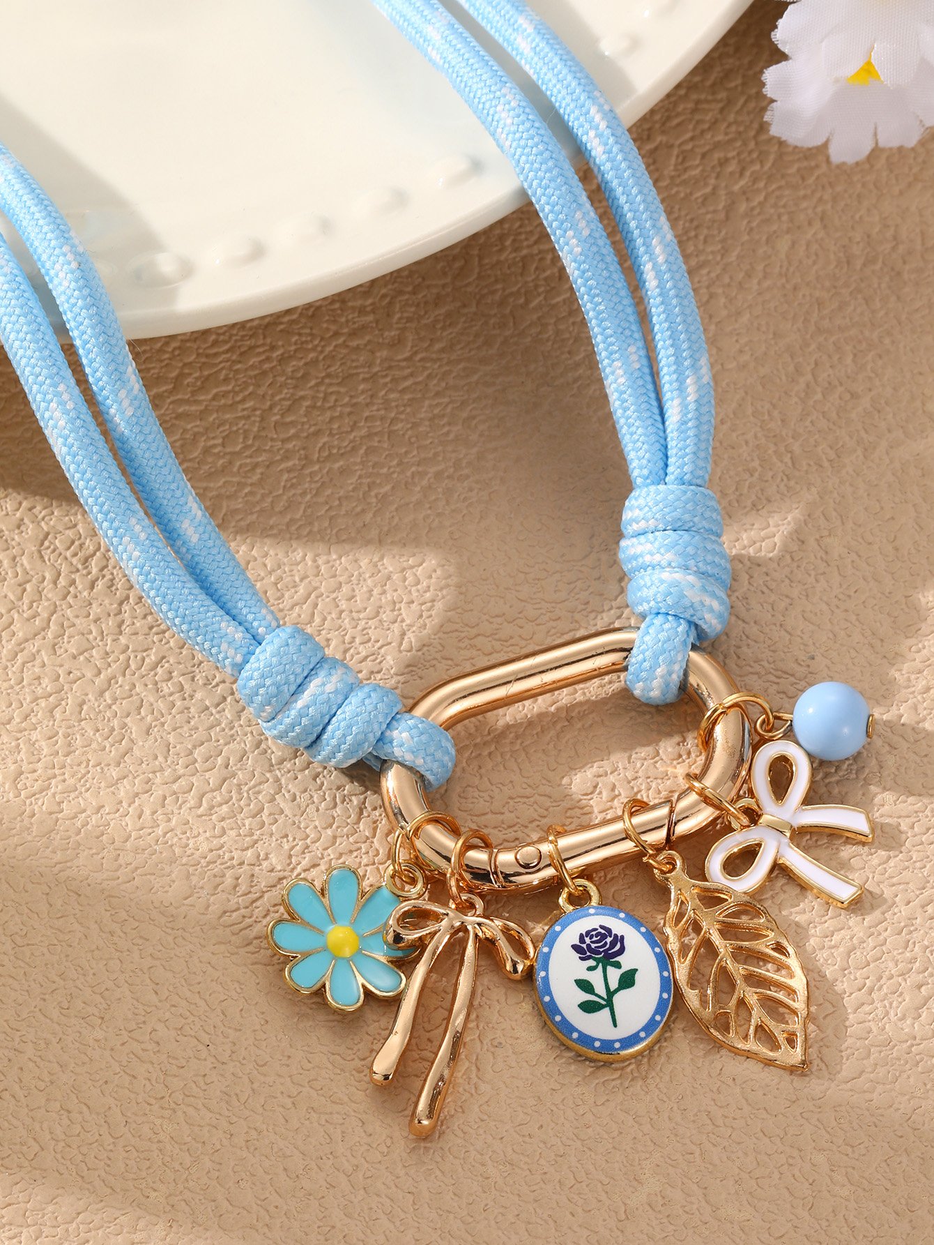 Blue Rope Charm Necklace with Gold Accents