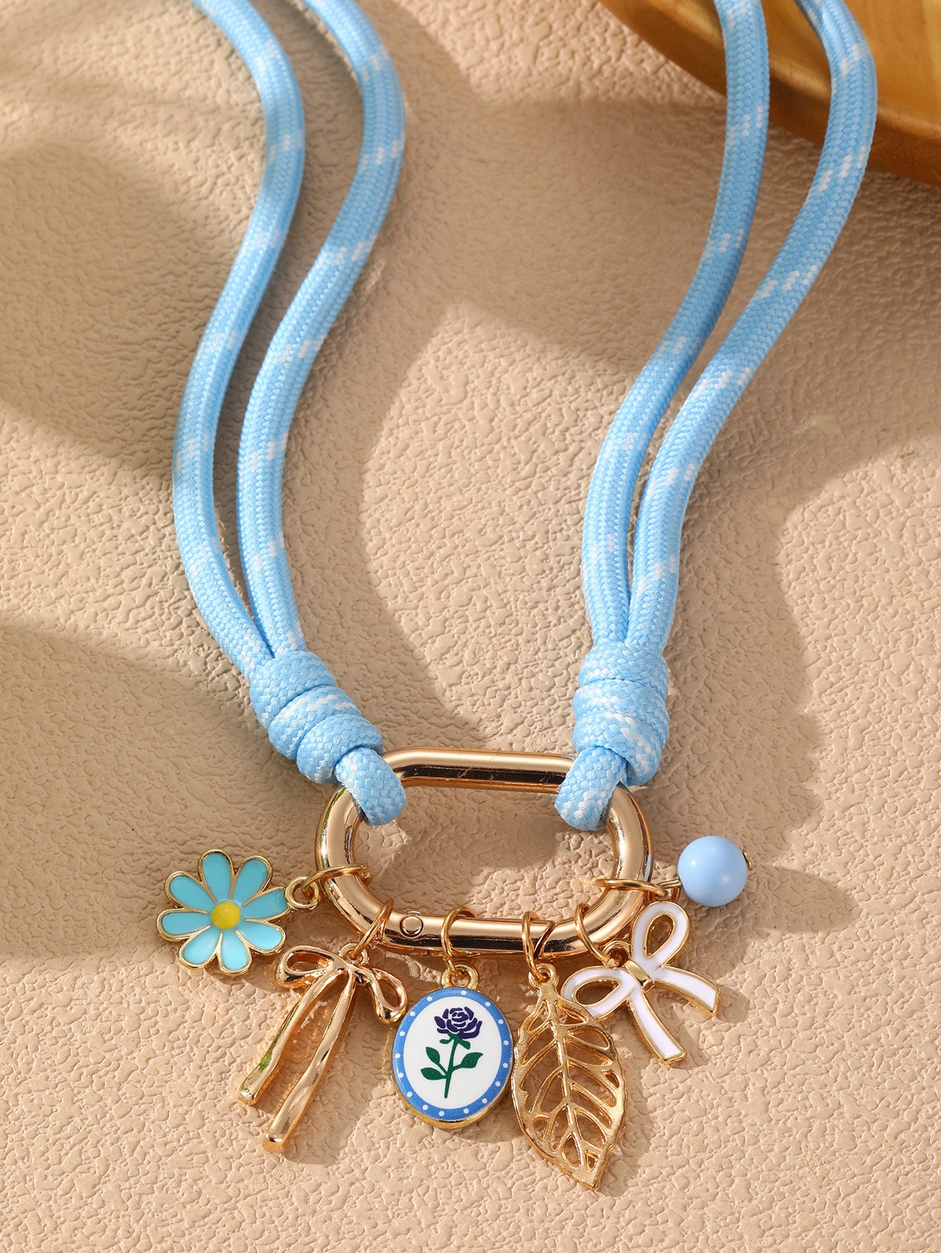 Blue Rope Charm Necklace with Gold Accents