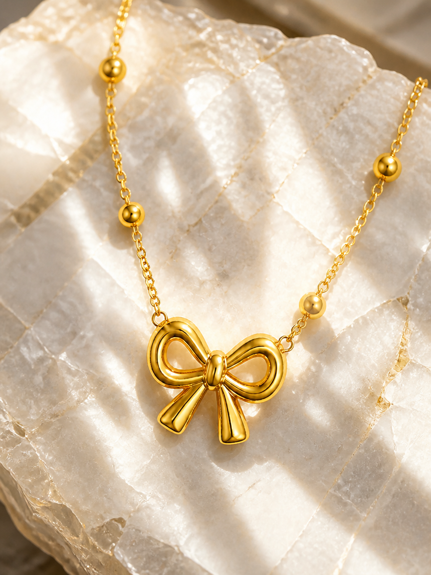 Gold Bow Charm Necklace