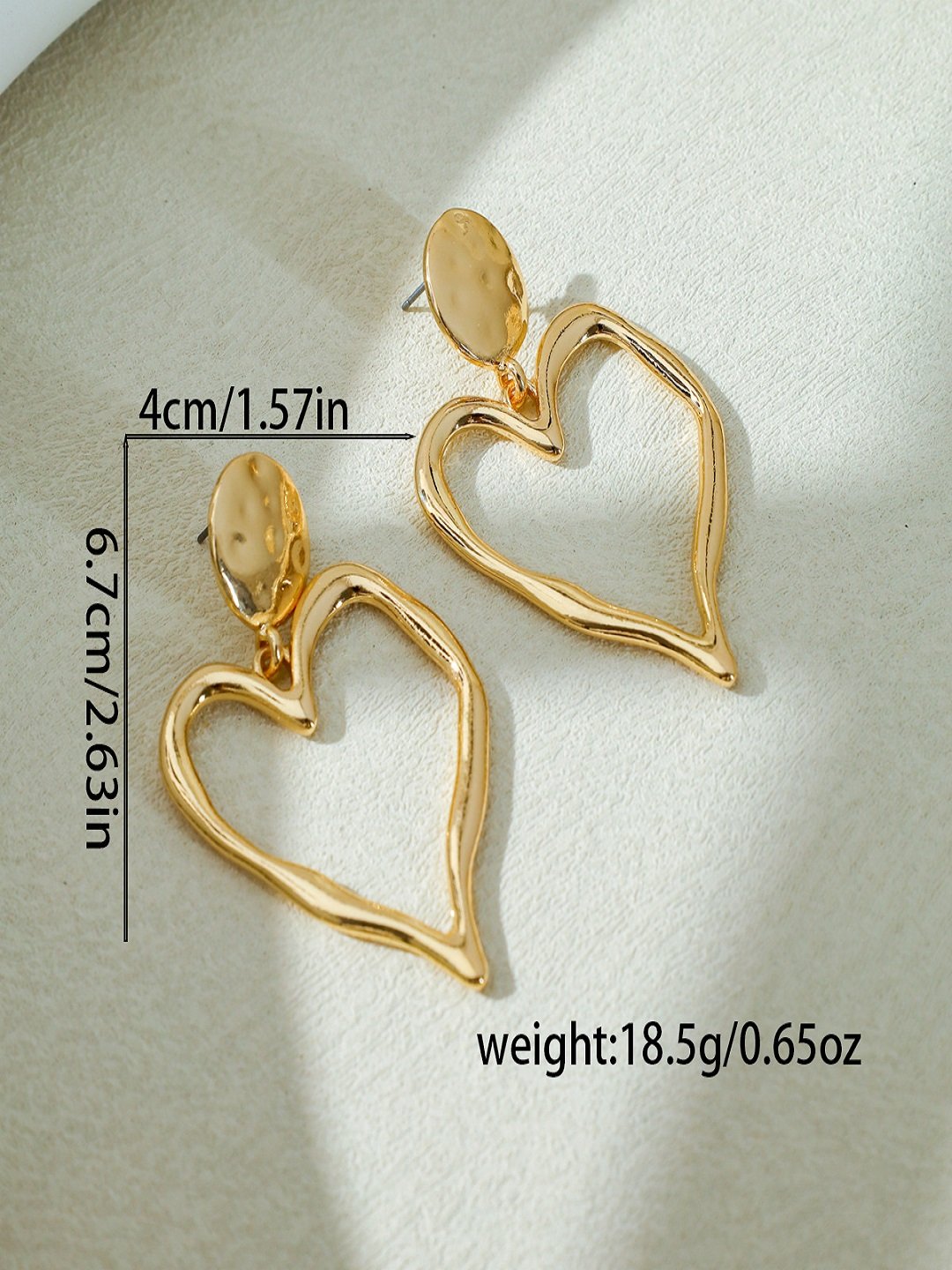 Gold Wavy Heart Dangle Earrings